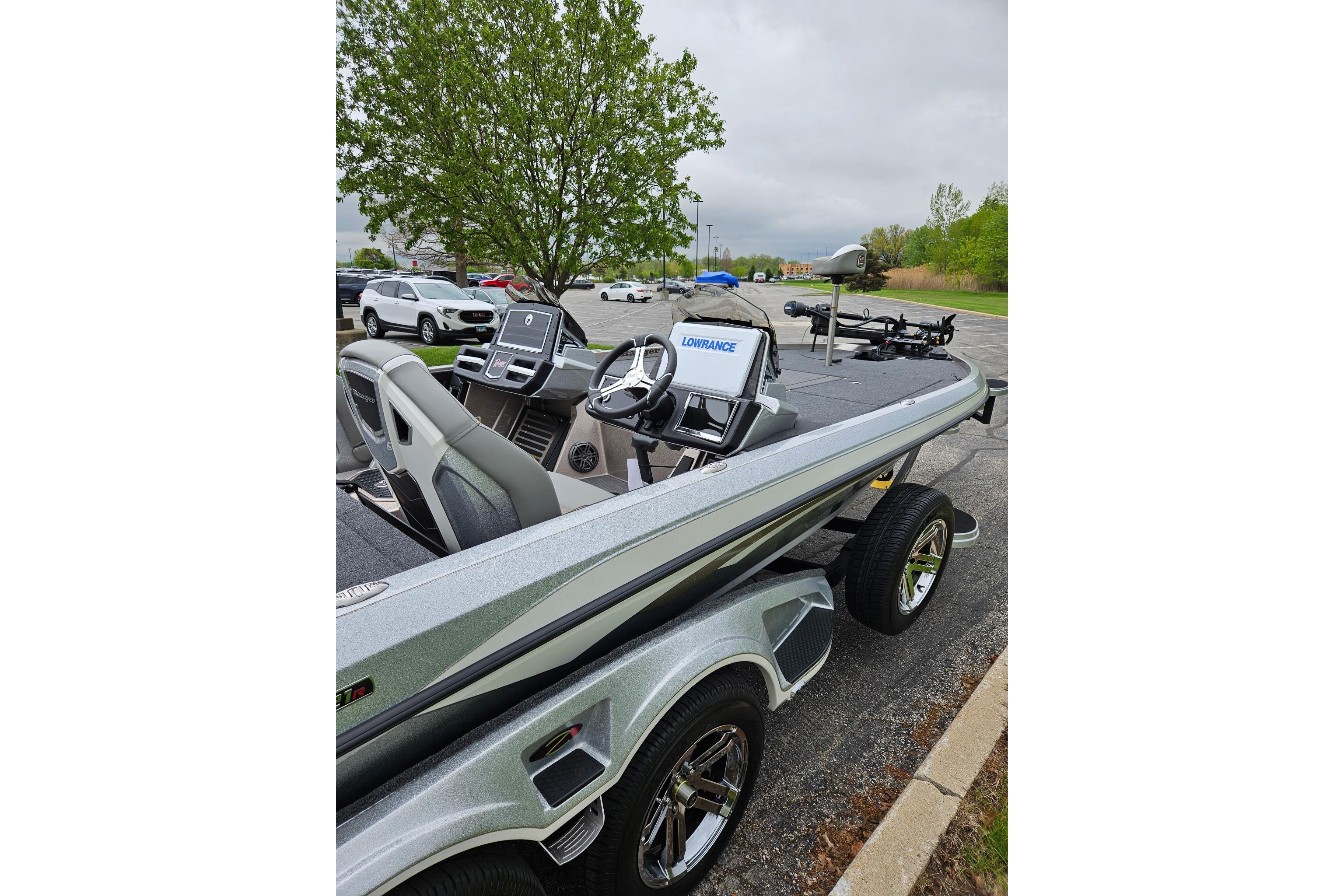 2026 Ranger Z521R Cup-Equipped boat with Lowrance electronics in a parking lot.