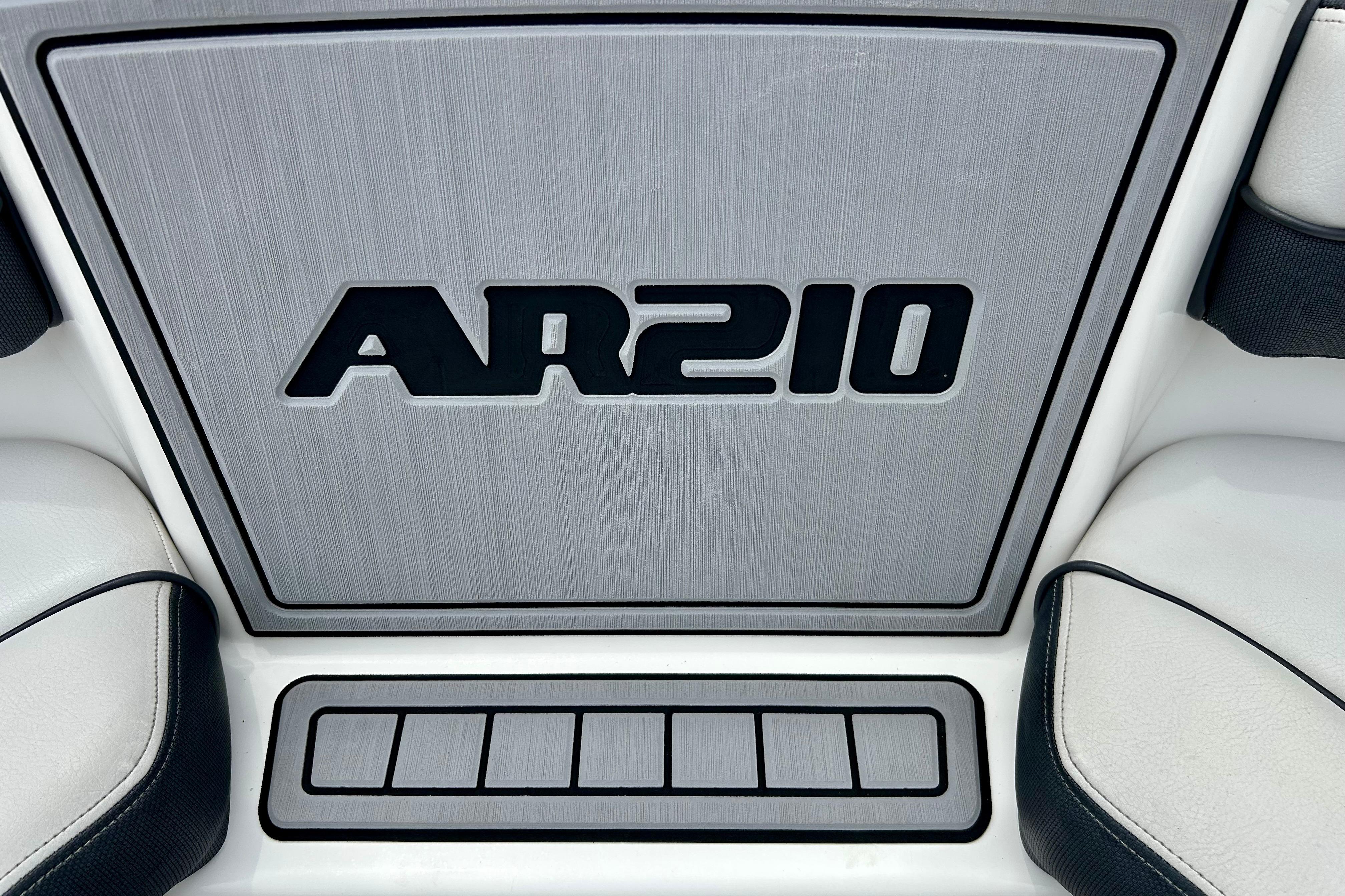 2015 Yamaha Boats AR210 interior detail with sleek design and branding.