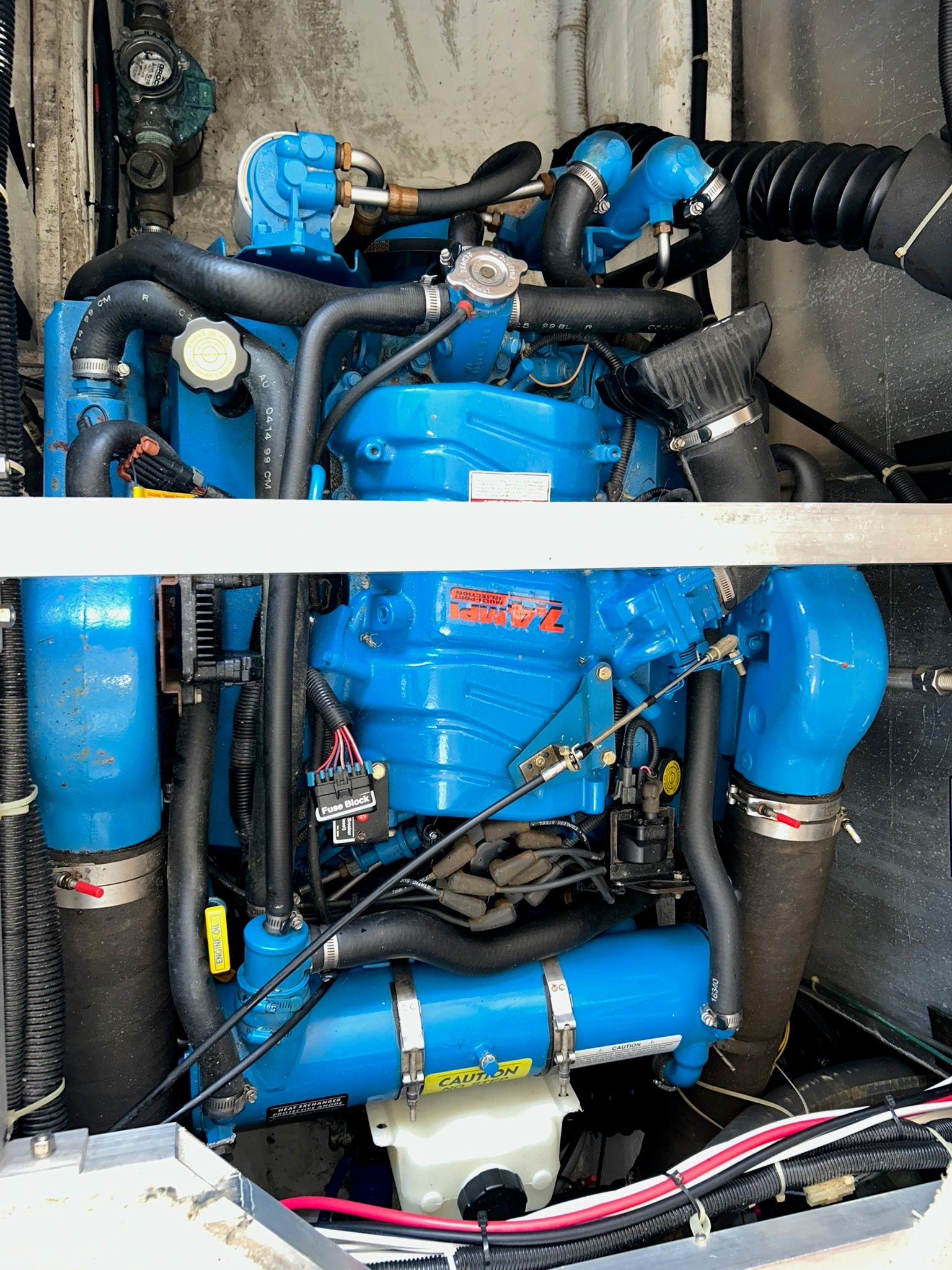 Engine compartment of 2000 Carver 356 Aft Cabin Yacht.