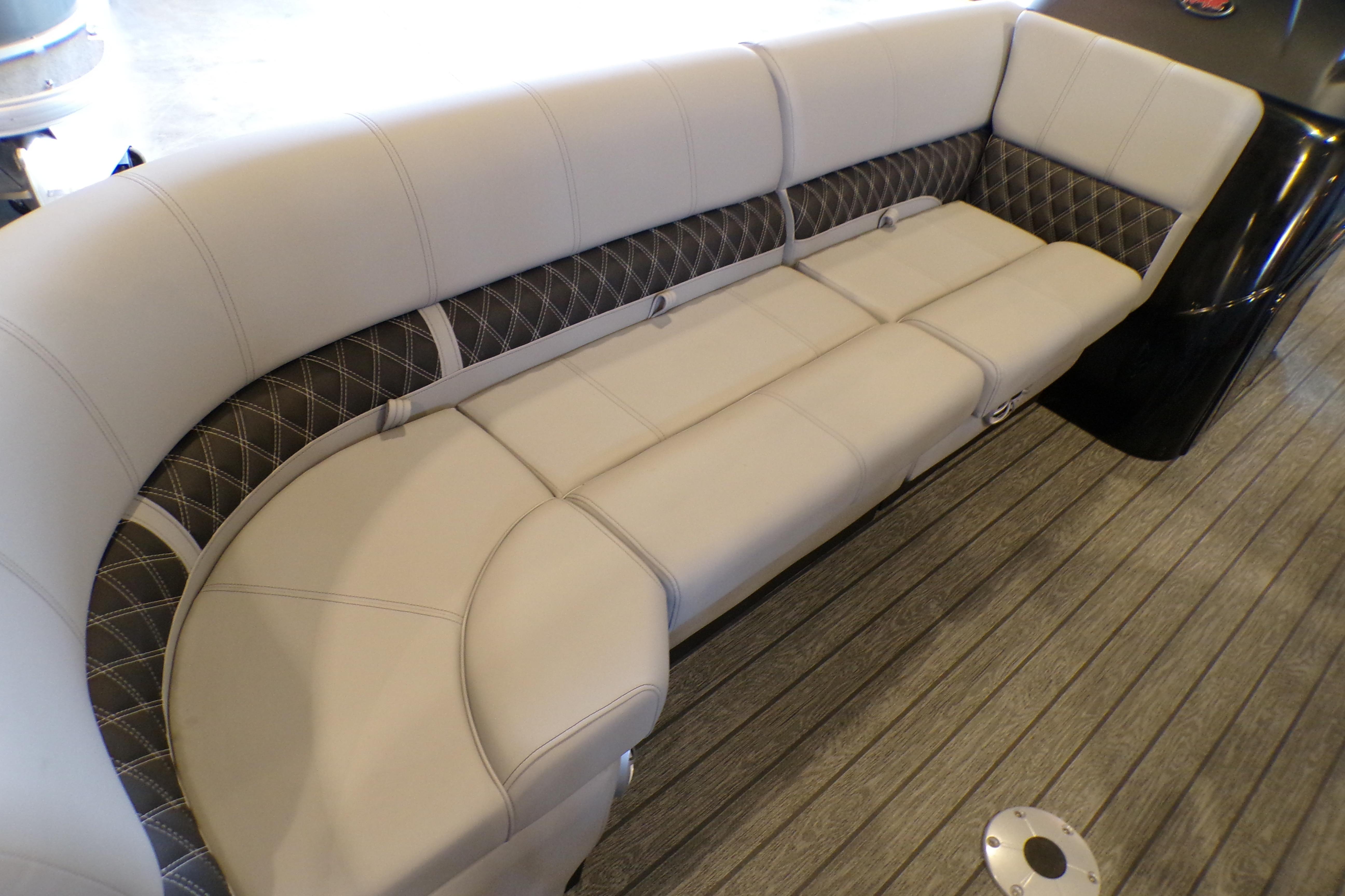 Luxurious seating on 2026 Ranger 220FC boat with elegant upholstery and modern design.