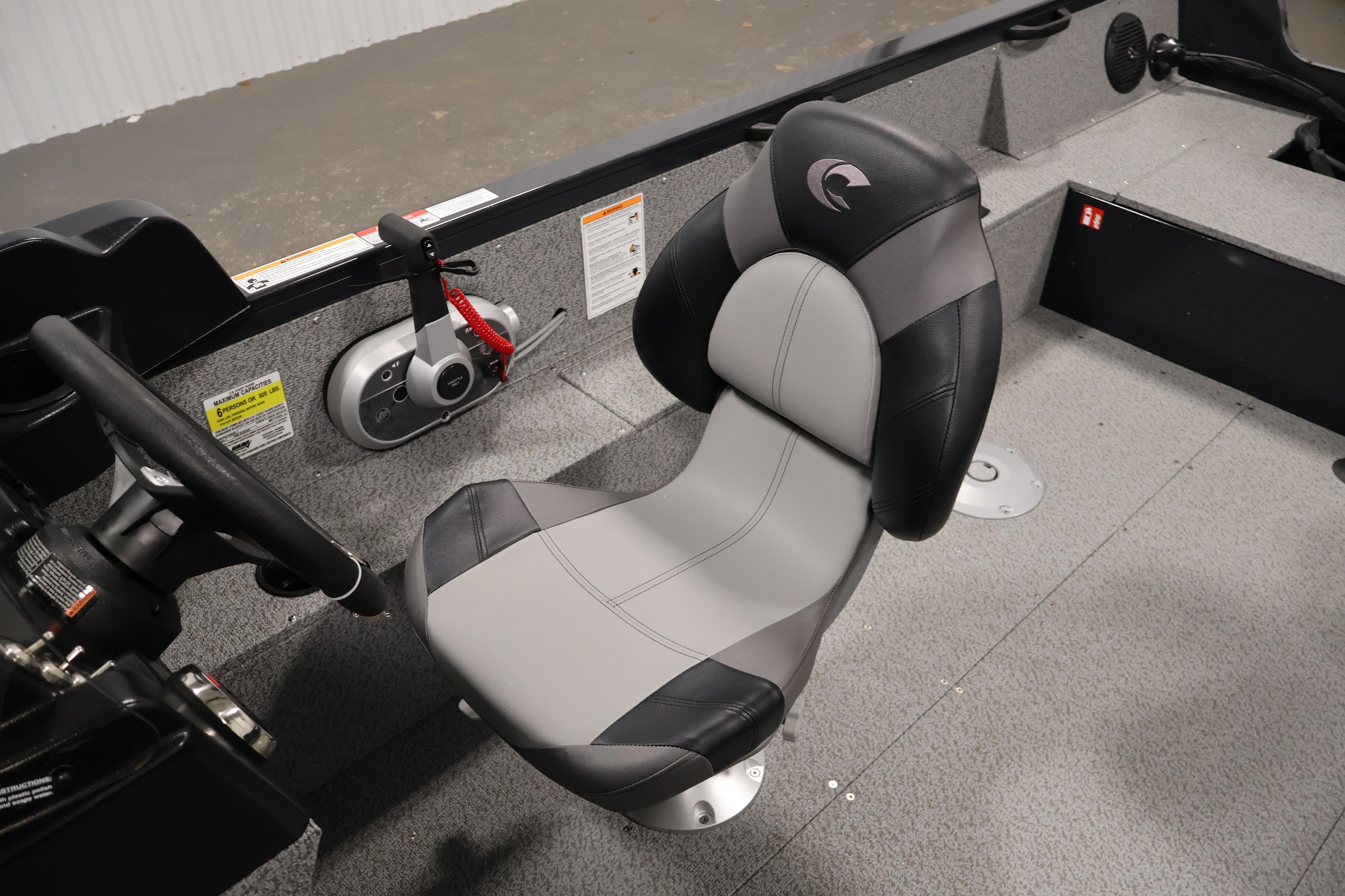 2026 Crestliner 1850 Kodiak SC boat interior with steering wheel and seat.