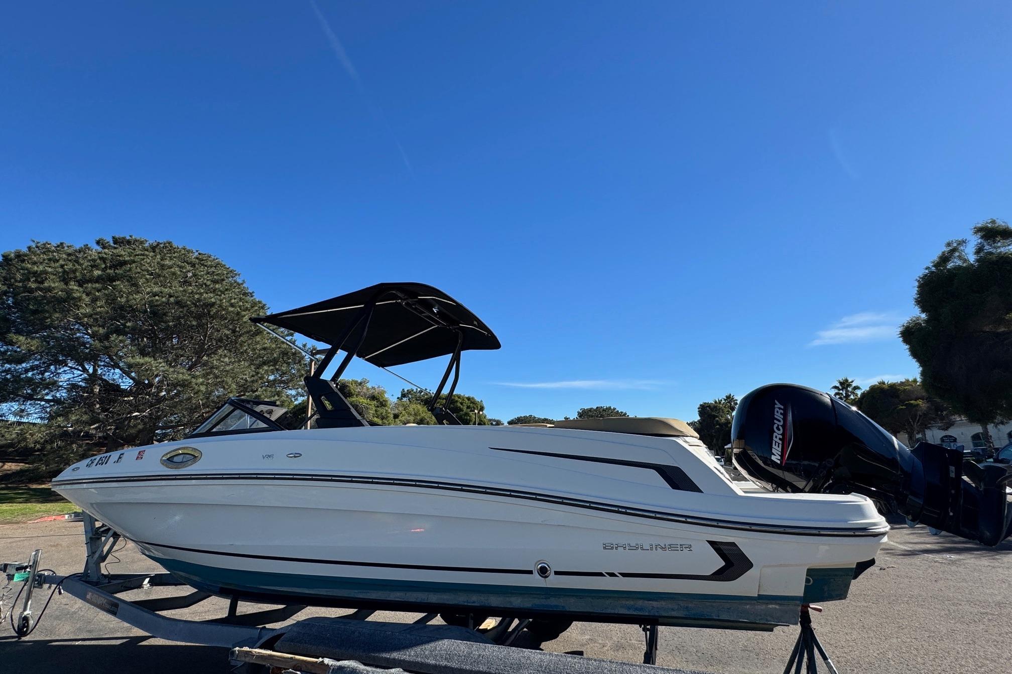 2022 Bayliner VR6 Bowrider OB on trailer under clear blue sky.