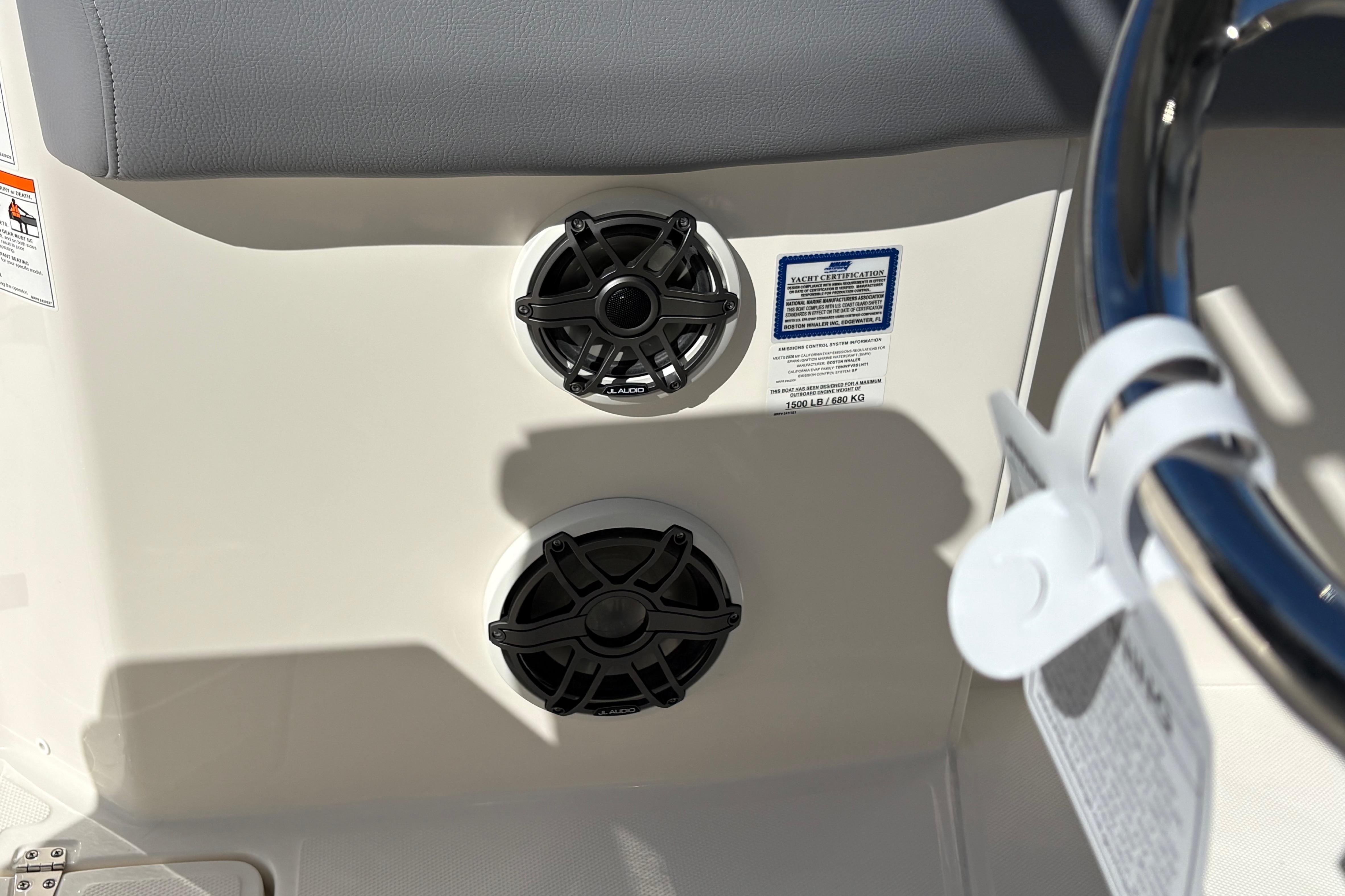 2026 Boston Whaler 280 Outrage boat speakers and certification label detail.