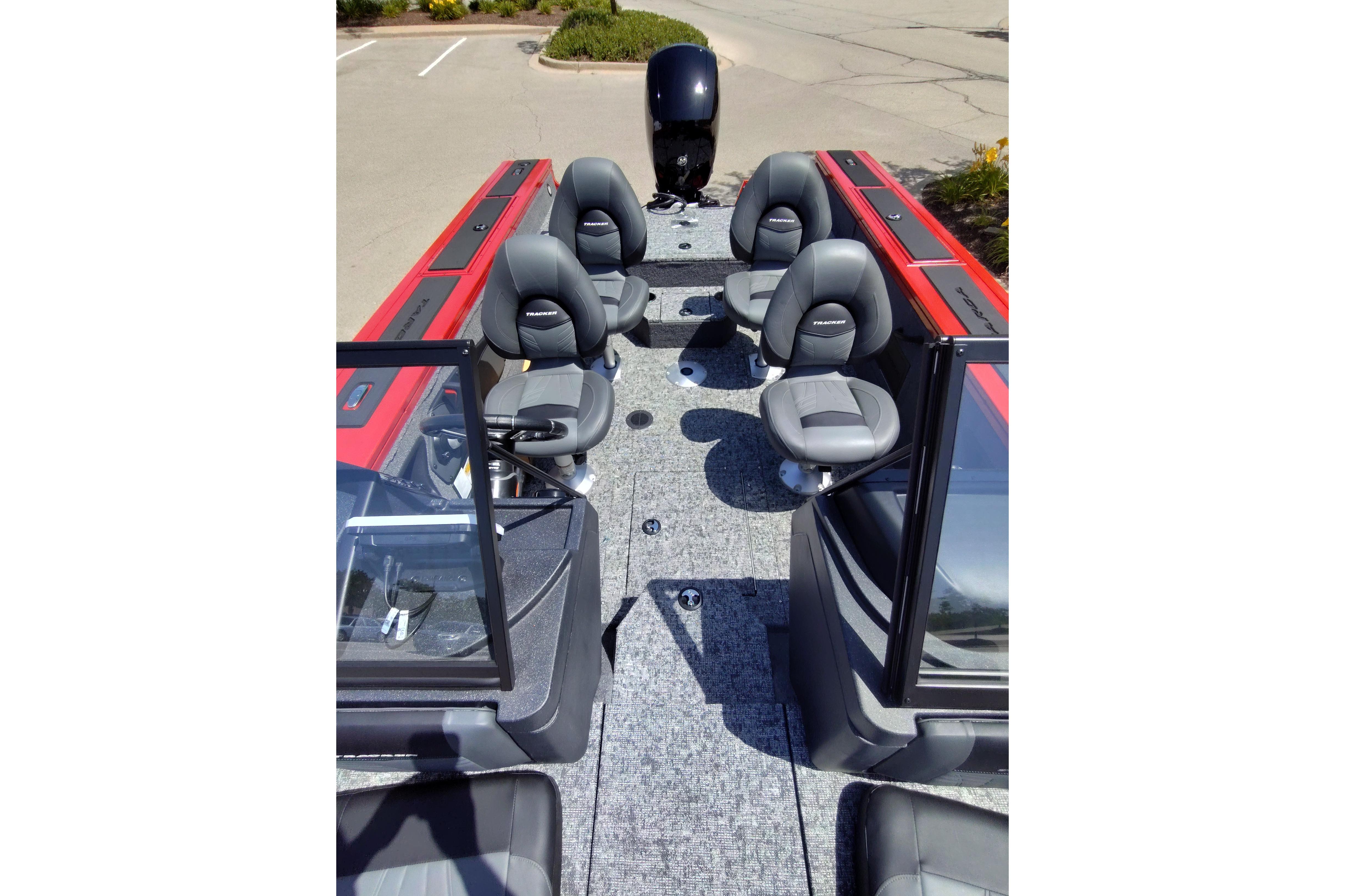 2026 Tracker Targa V-18 Combo boat interior with four gray seats and red accents.