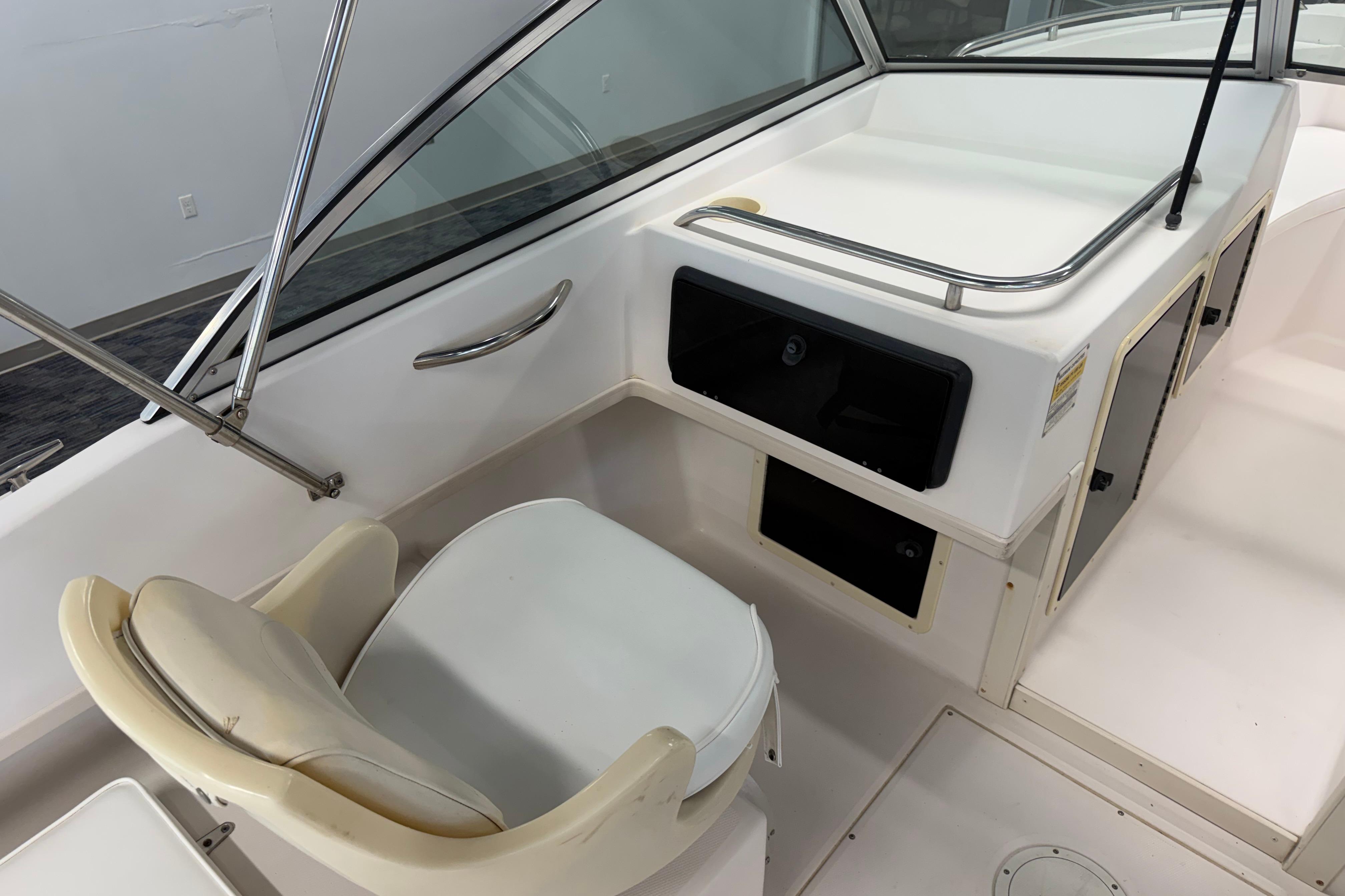 2001 Grady-White Tournament 223 boat interior with seating and storage compartments.