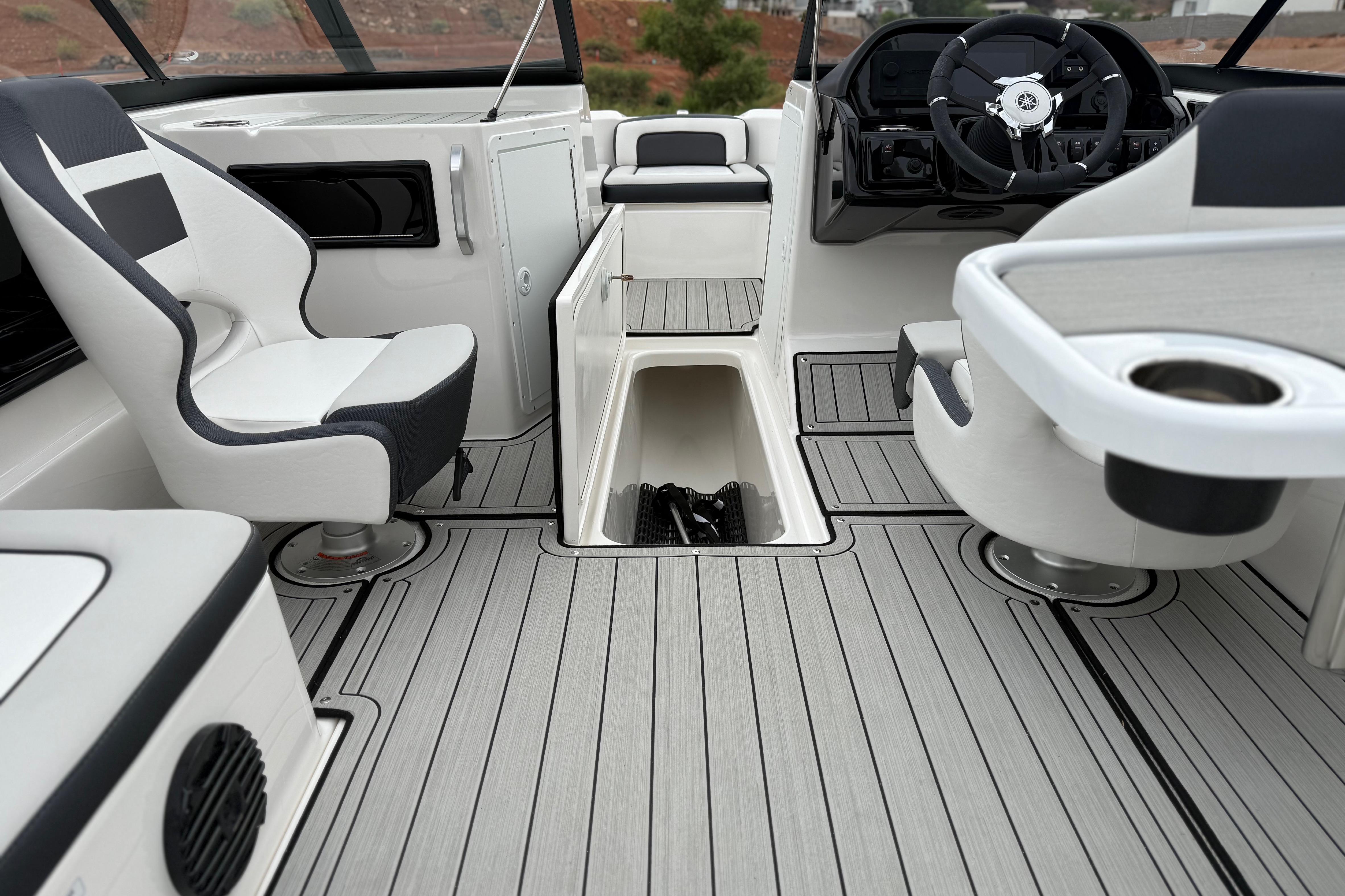 Interior of 2025 Yamaha Boats 195S, featuring sleek seating and modern dashboard design.