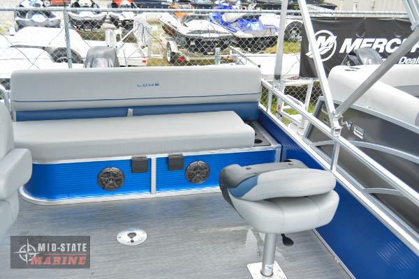 2024 Lowe Ultra 200 Cruise boat interior with seating and steering chair.