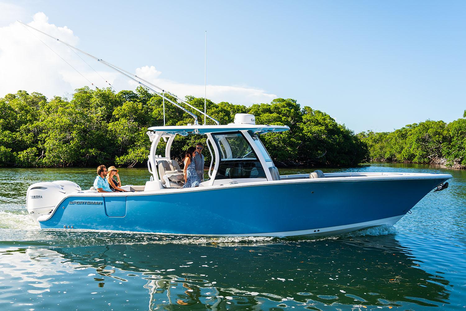 Manufacturer Provided Image: 2025 Sportsman Open 302 Center Console boat cruising on a sunny day.