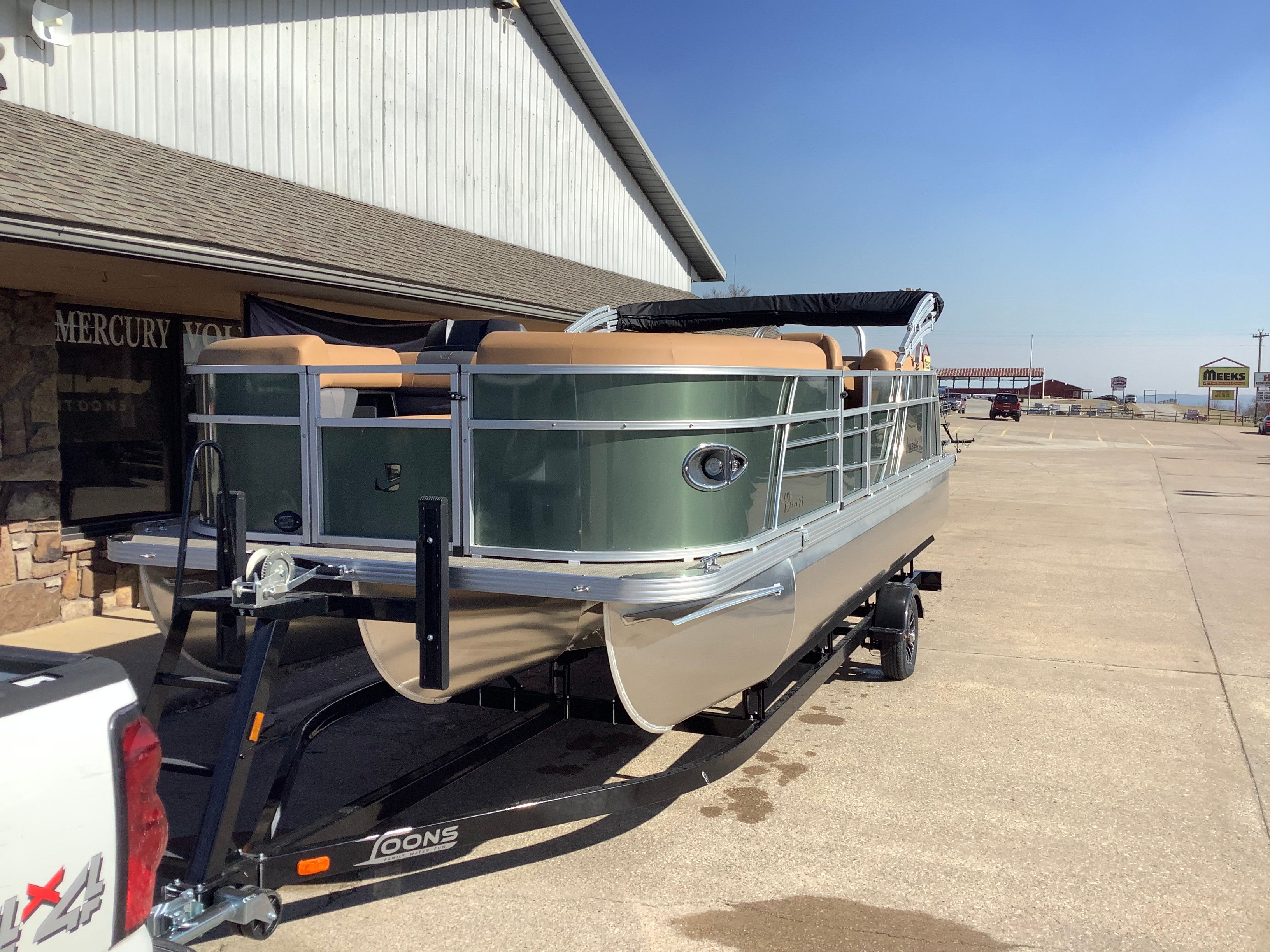 2026 Landau 21 Island Breeze pontoon boat on trailer.