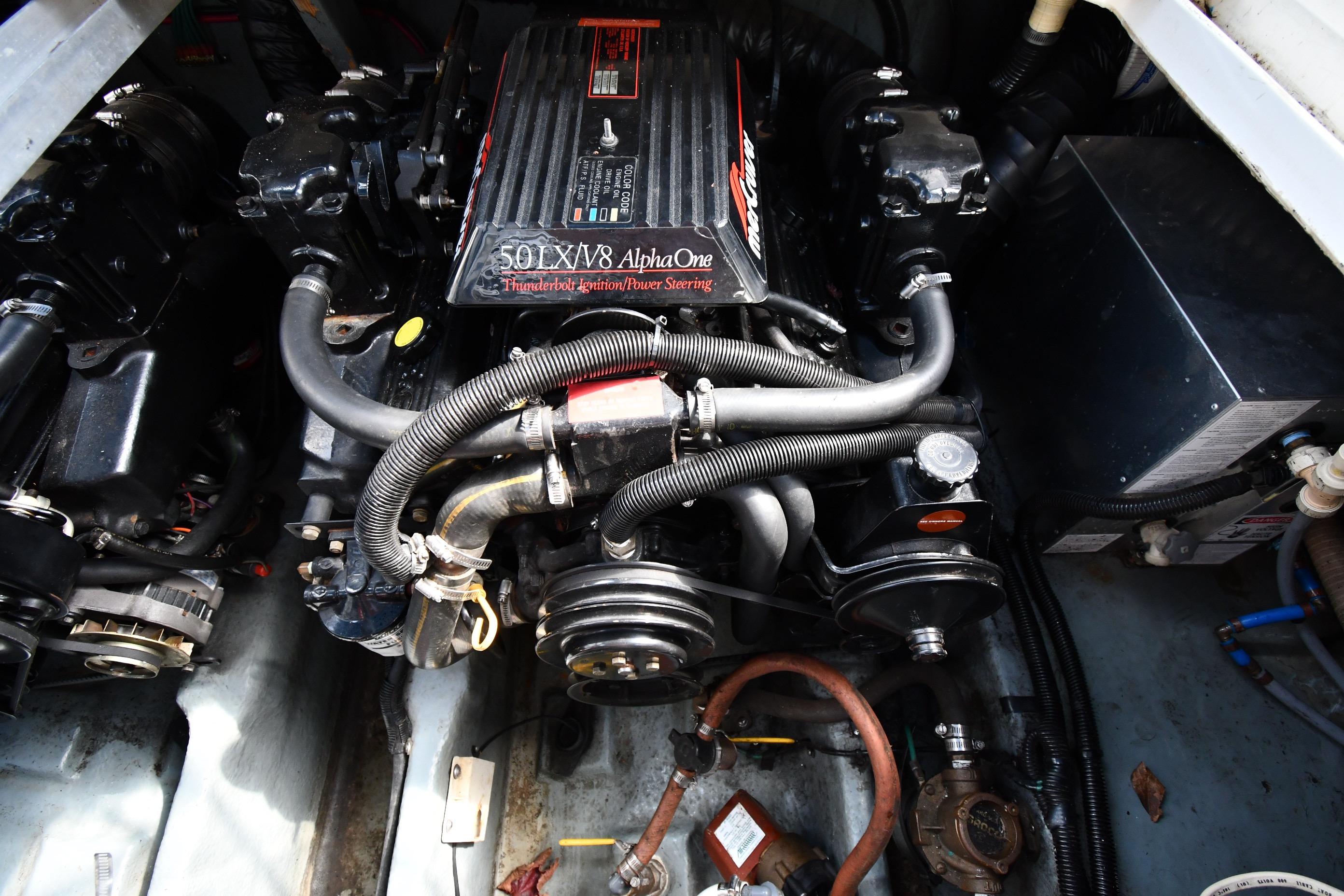 Engine compartment of a 1993 Sea Ray 300 Sundancer with 5.0L V8 Alpha One engine.