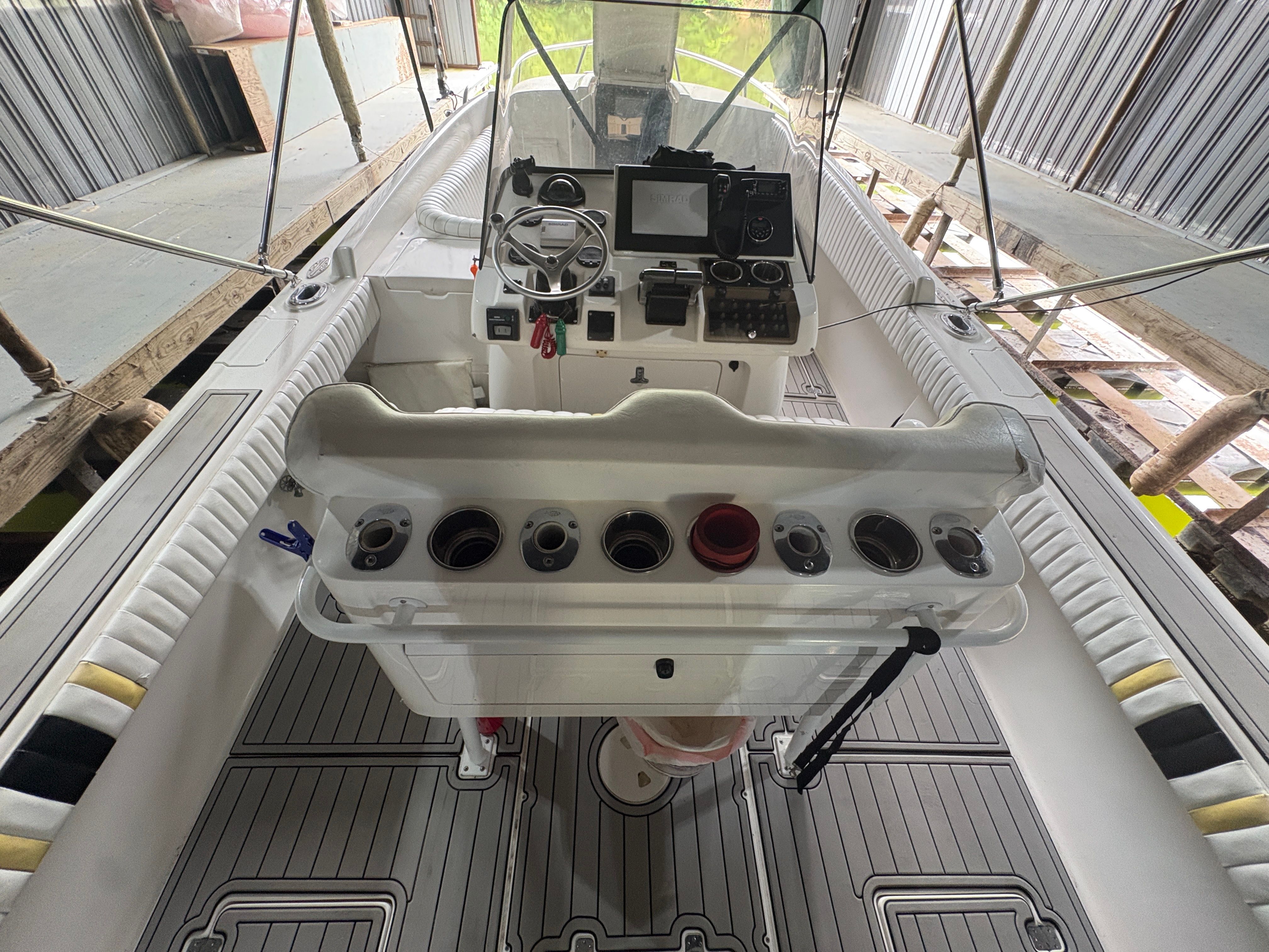 Interior of a 2002 Intrepid 322 Cuddy Center Console boat.