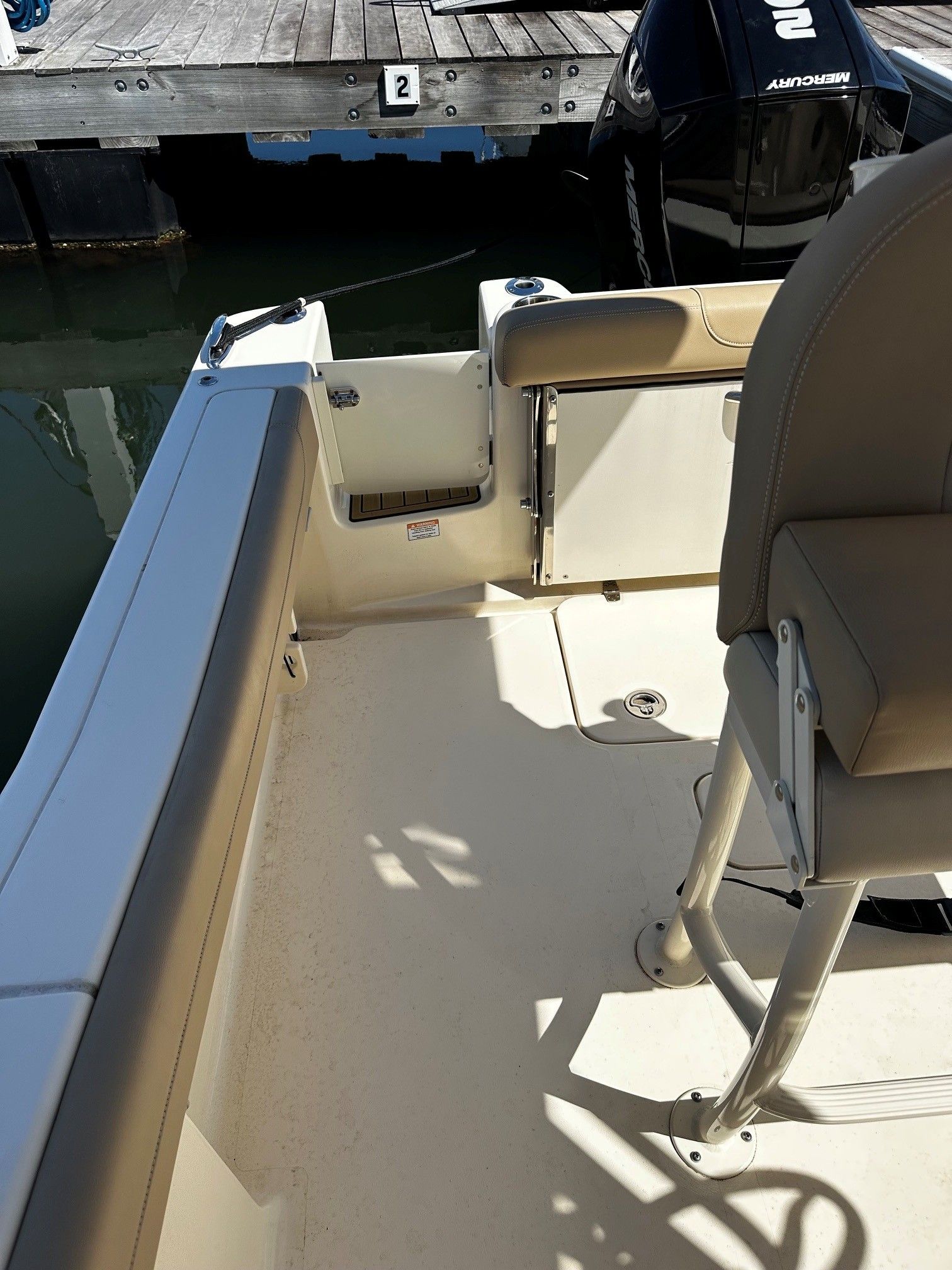 Interior of a 2022 Scout 210XSF boat at the dock.