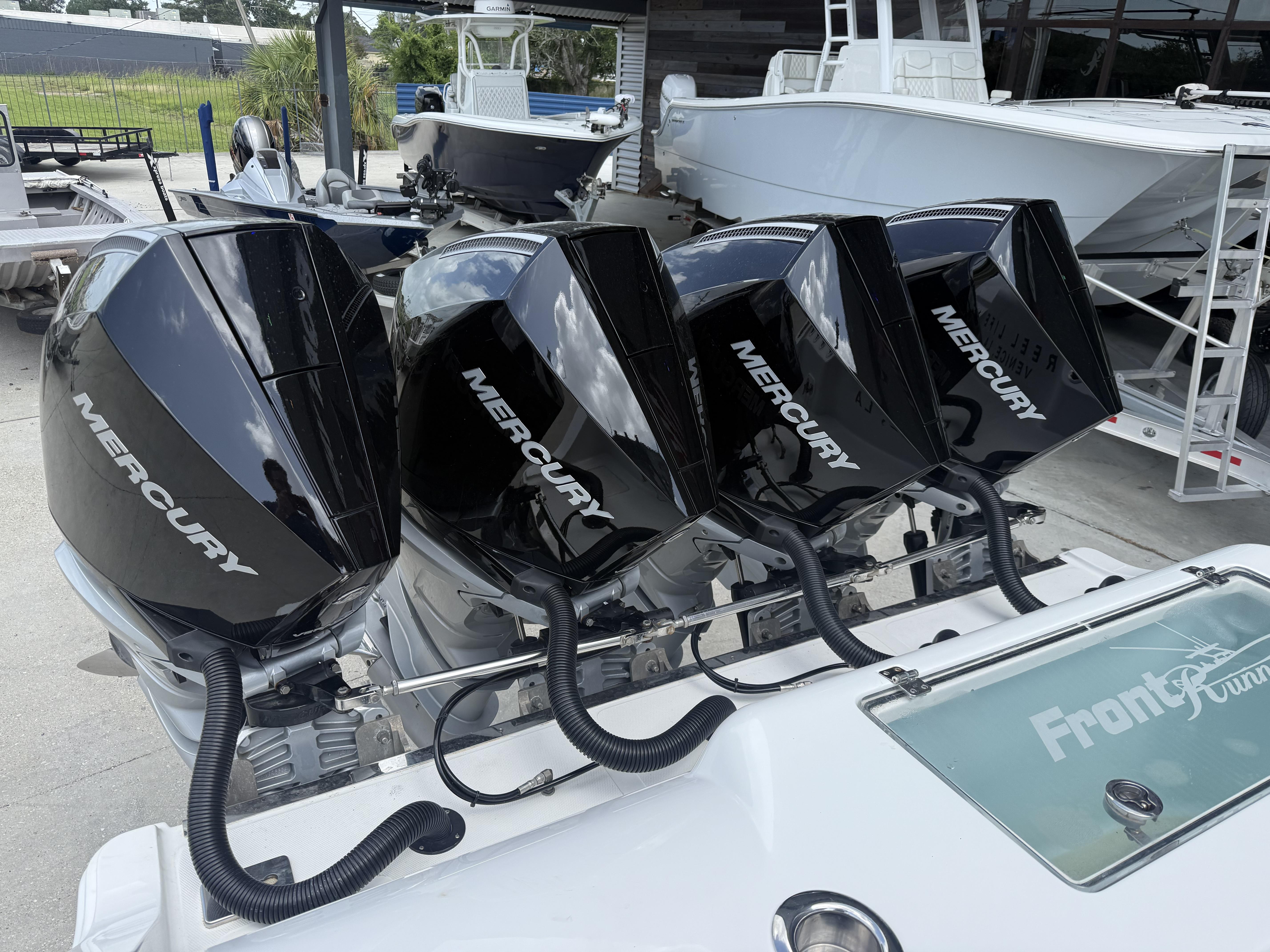 2024 Front Runner 39 CC boat with four Mercury outboard engines.