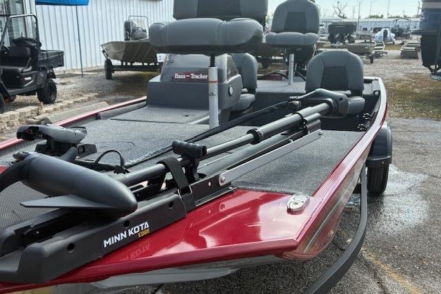 2025 Tracker Bass Tracker Classic XL boat with Minn Kota trolling motor, parked outdoors.