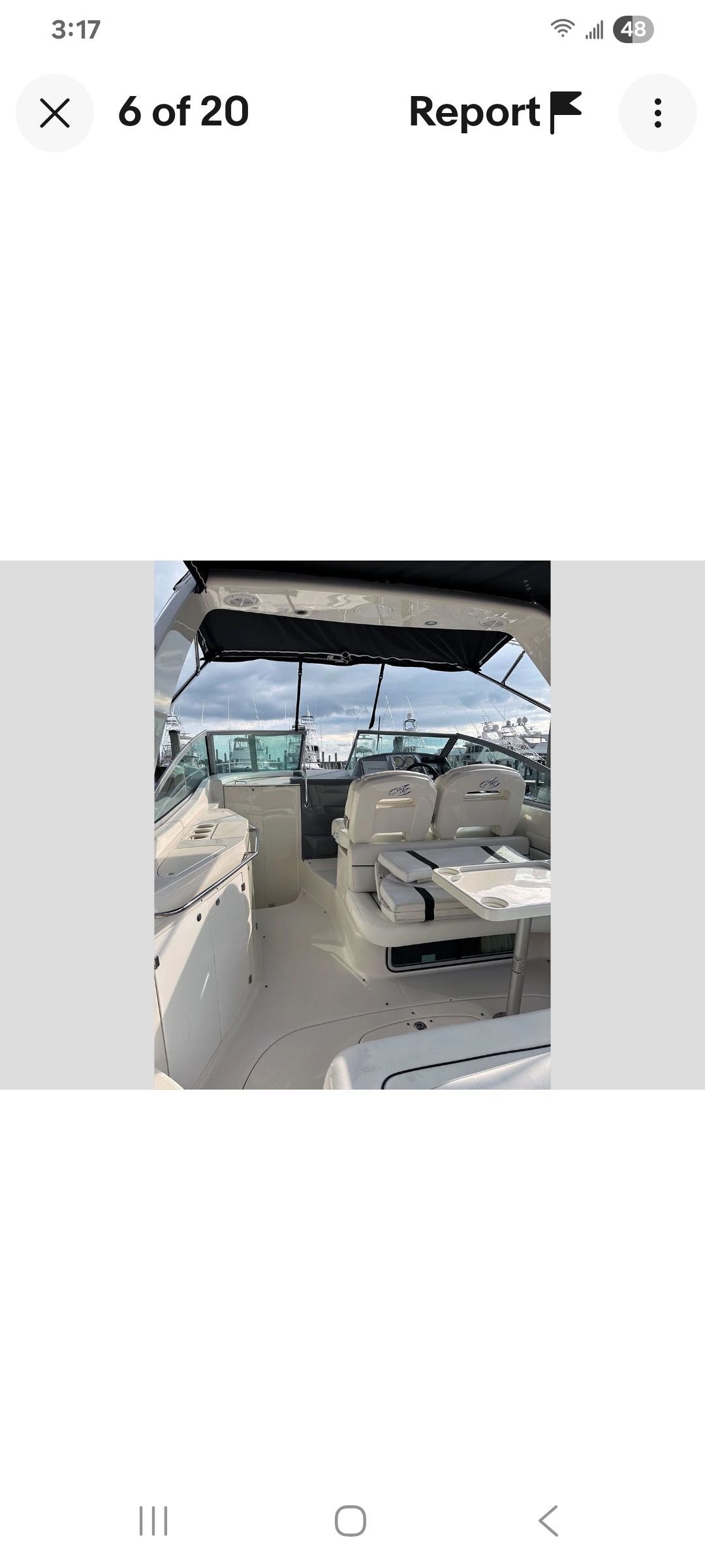 Interior view of a Monterey 290 Cruiser with seating area and helm.