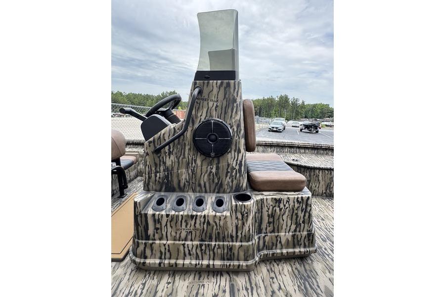 2027 Excel 230 Bay Pro Elite boat console with camouflage design and seating.