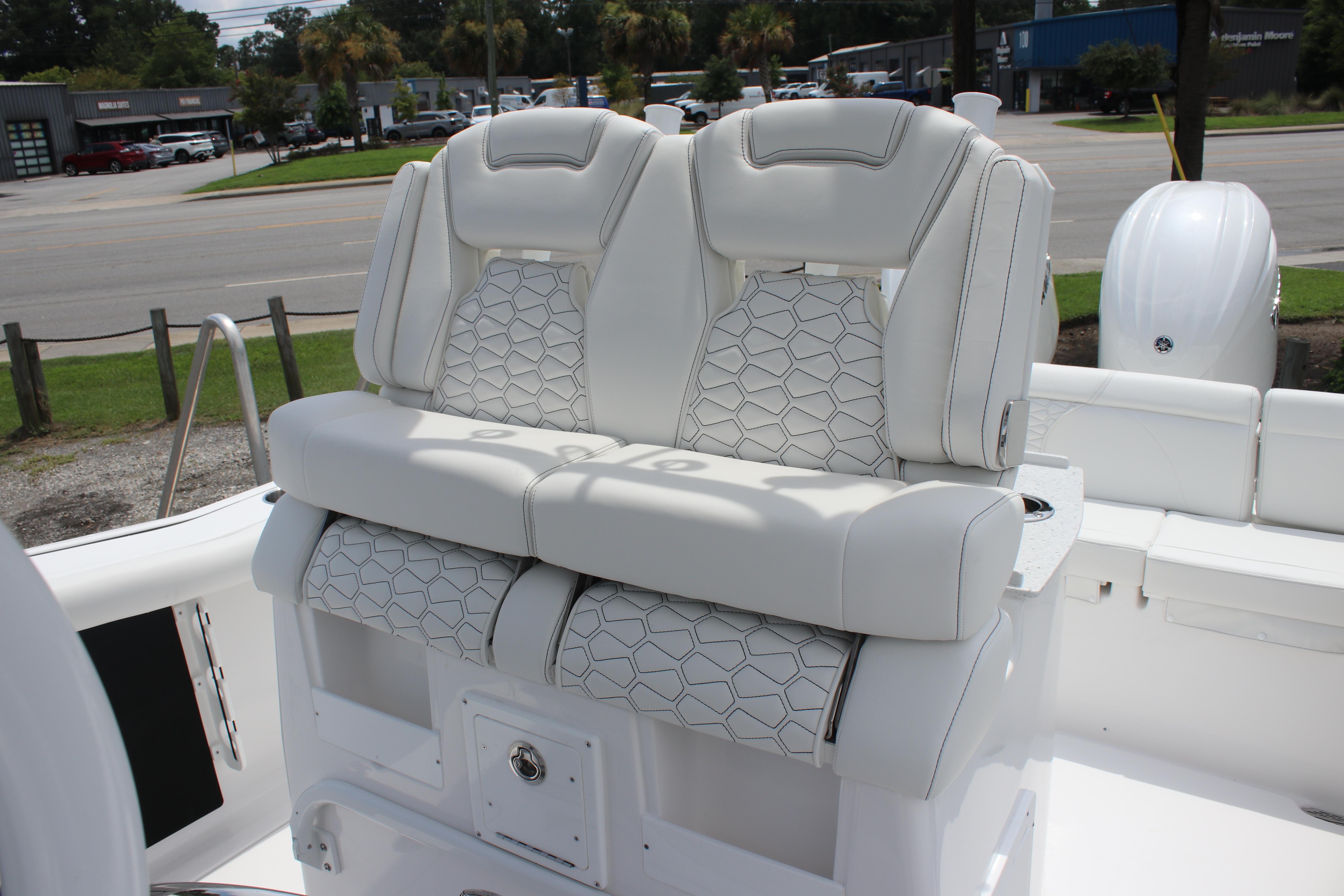 2026 Tidewater 272 LXF boat with luxurious white seating and modern design.