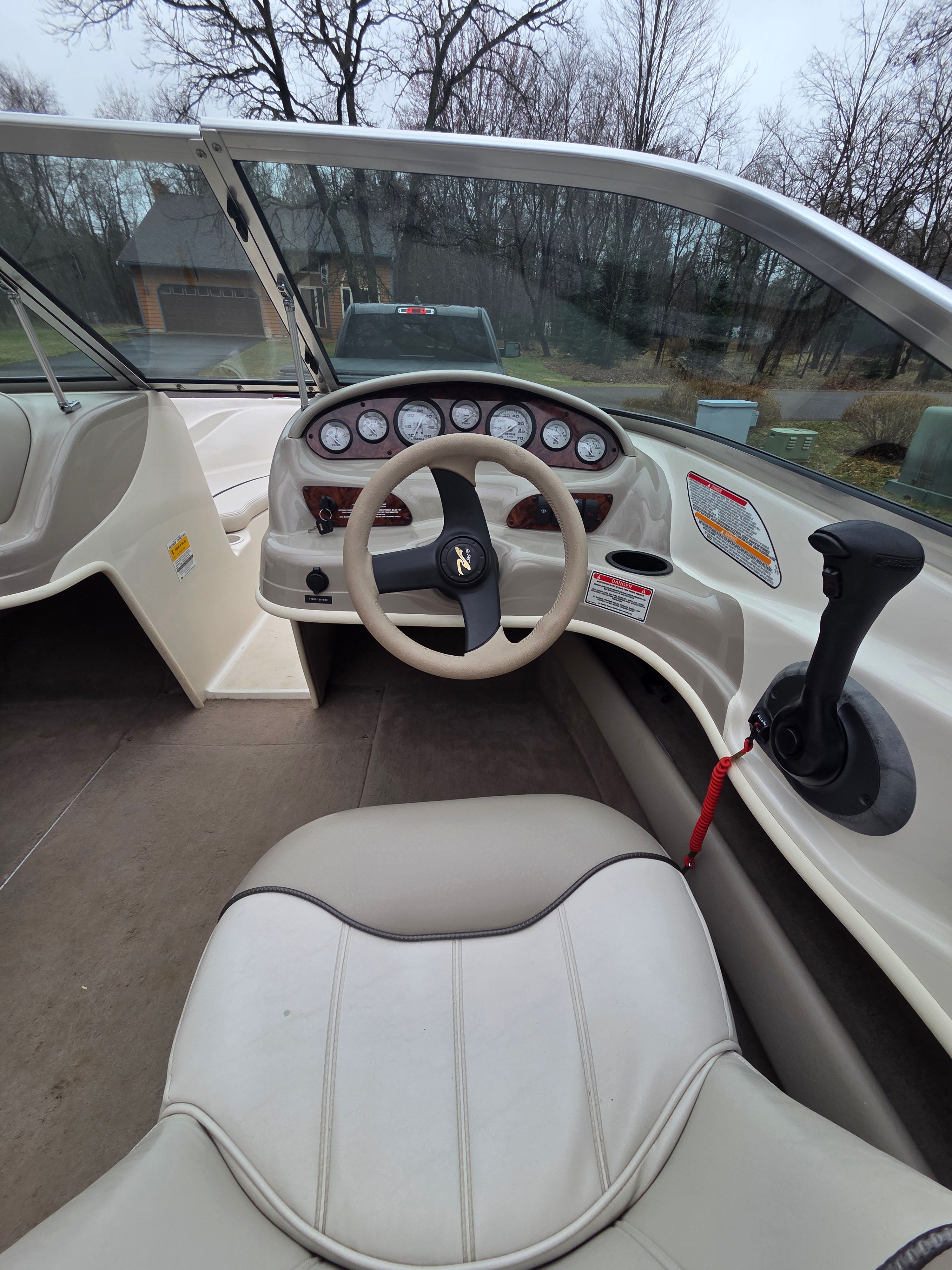Interior view of a 2002 Sea Ray 182 boat cockpit.