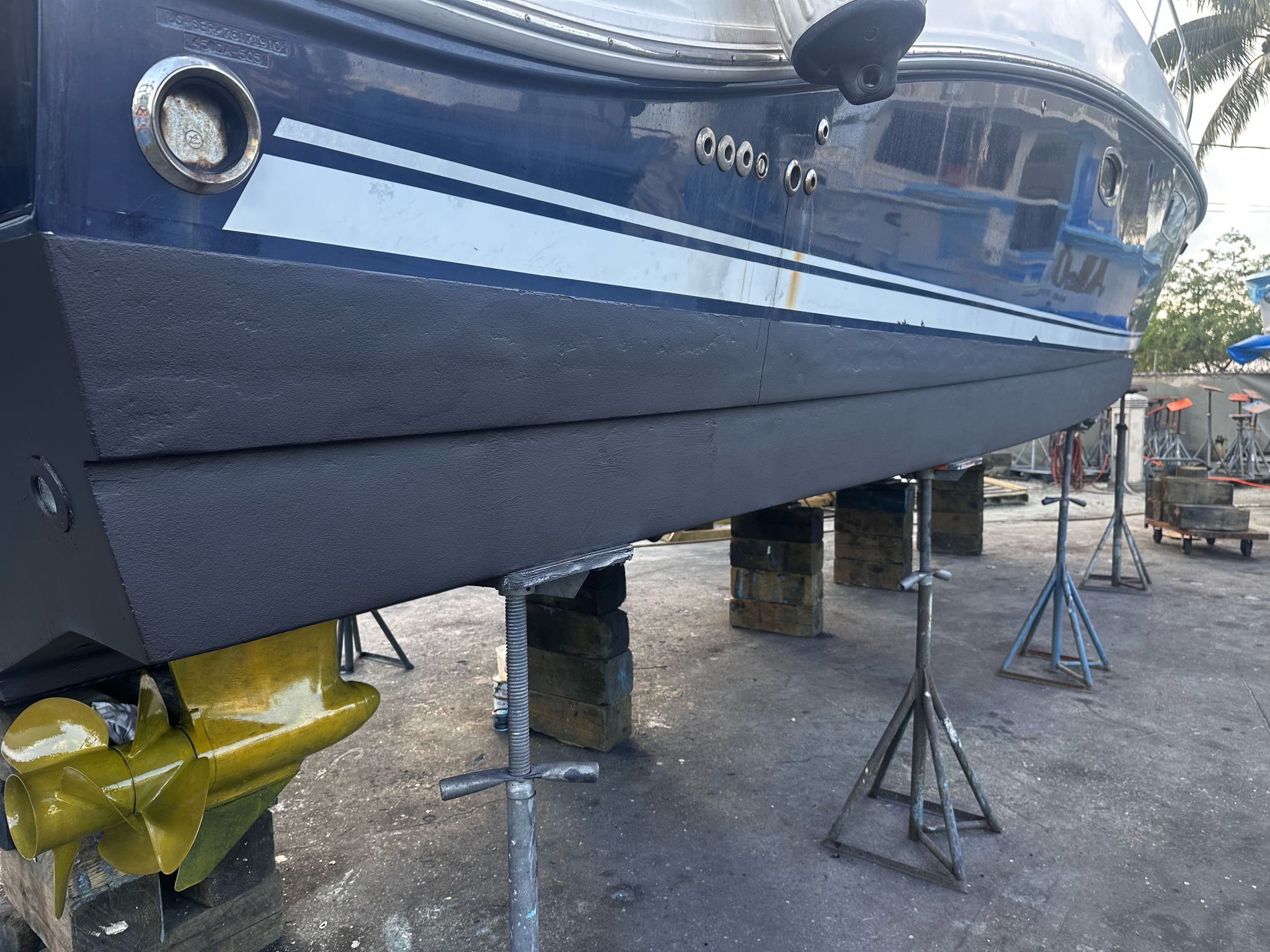2010 Sea Ray 450 boat elevated for maintenance.