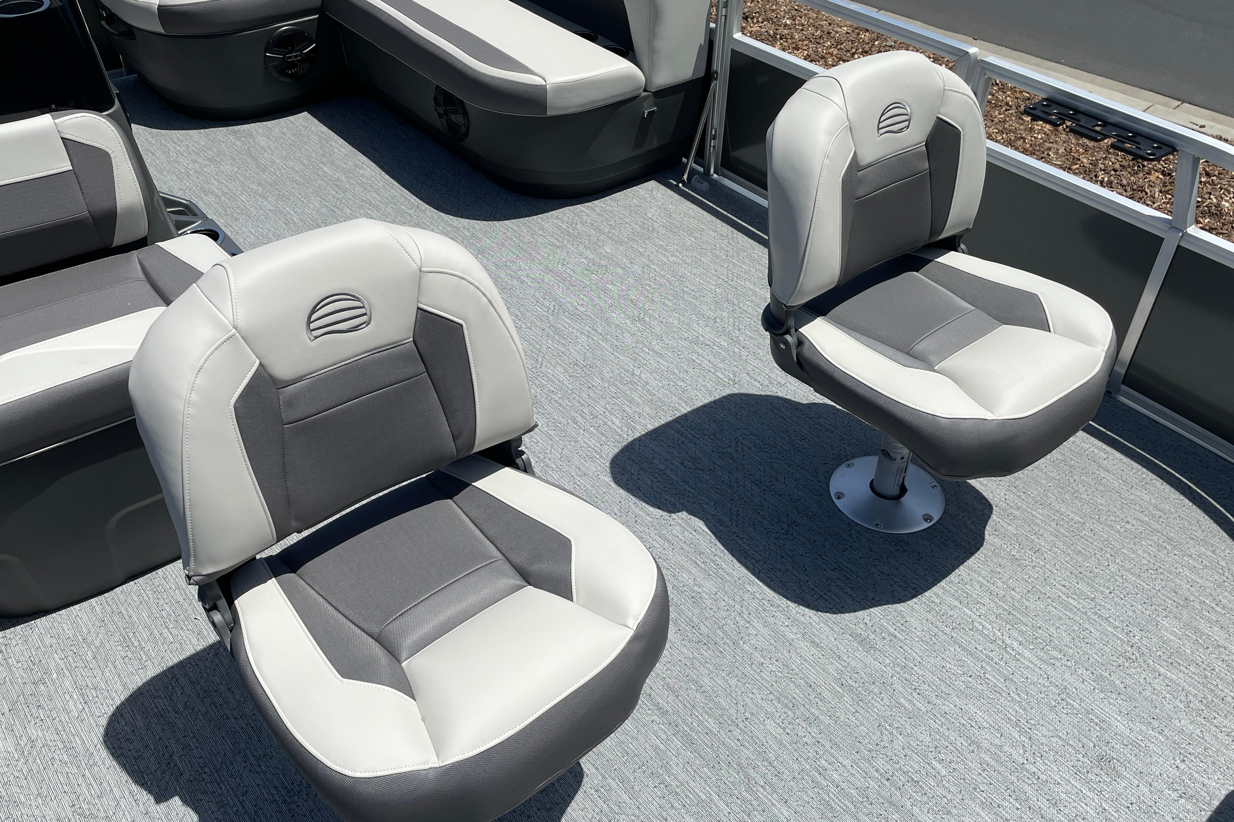 2026 Sun Tracker Bass Buggy 16 XL Select boat seats, featuring gray and white upholstery.