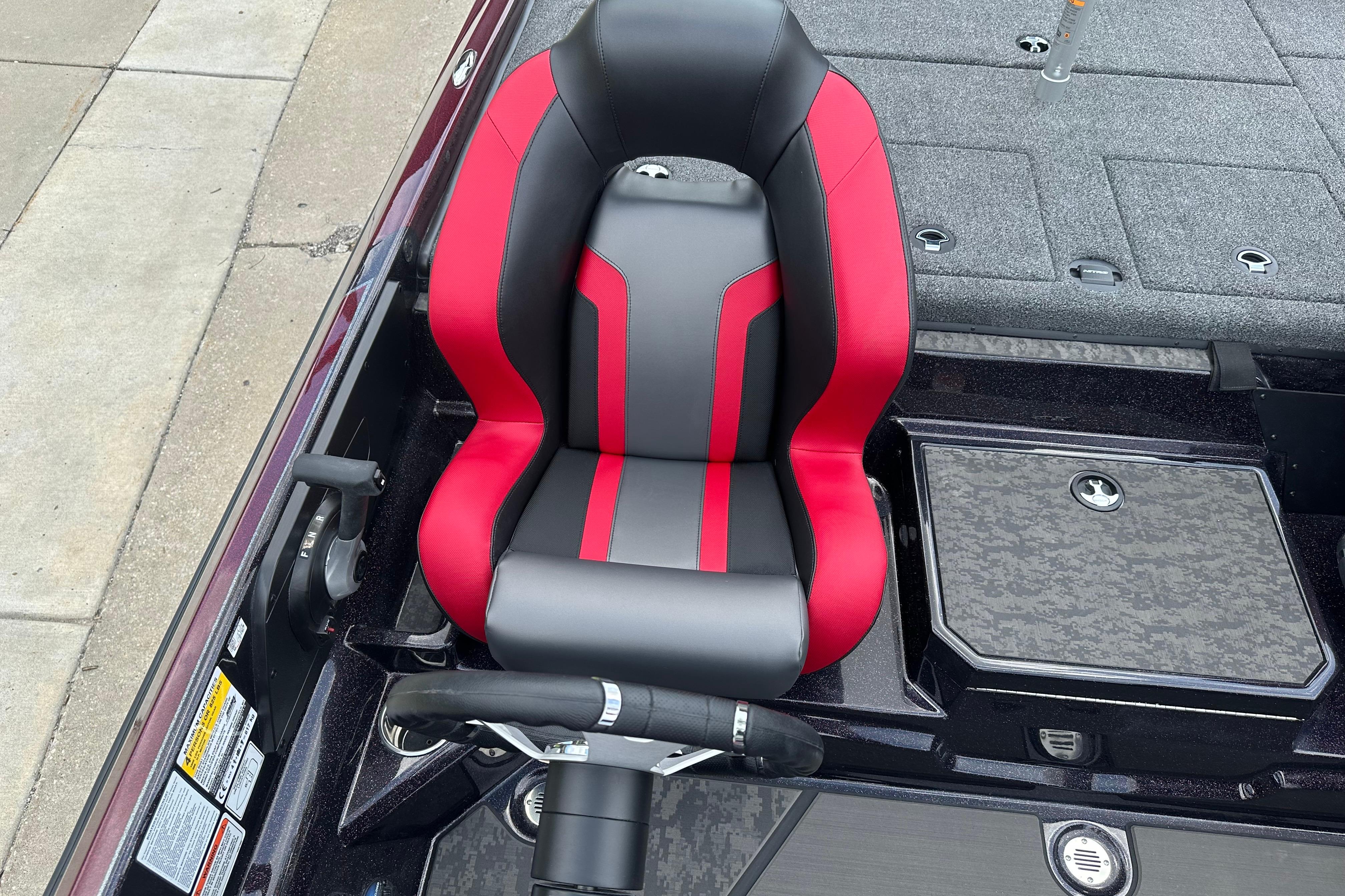 Red and black seat in 2026 Nitro Z21 XL boat cockpit.