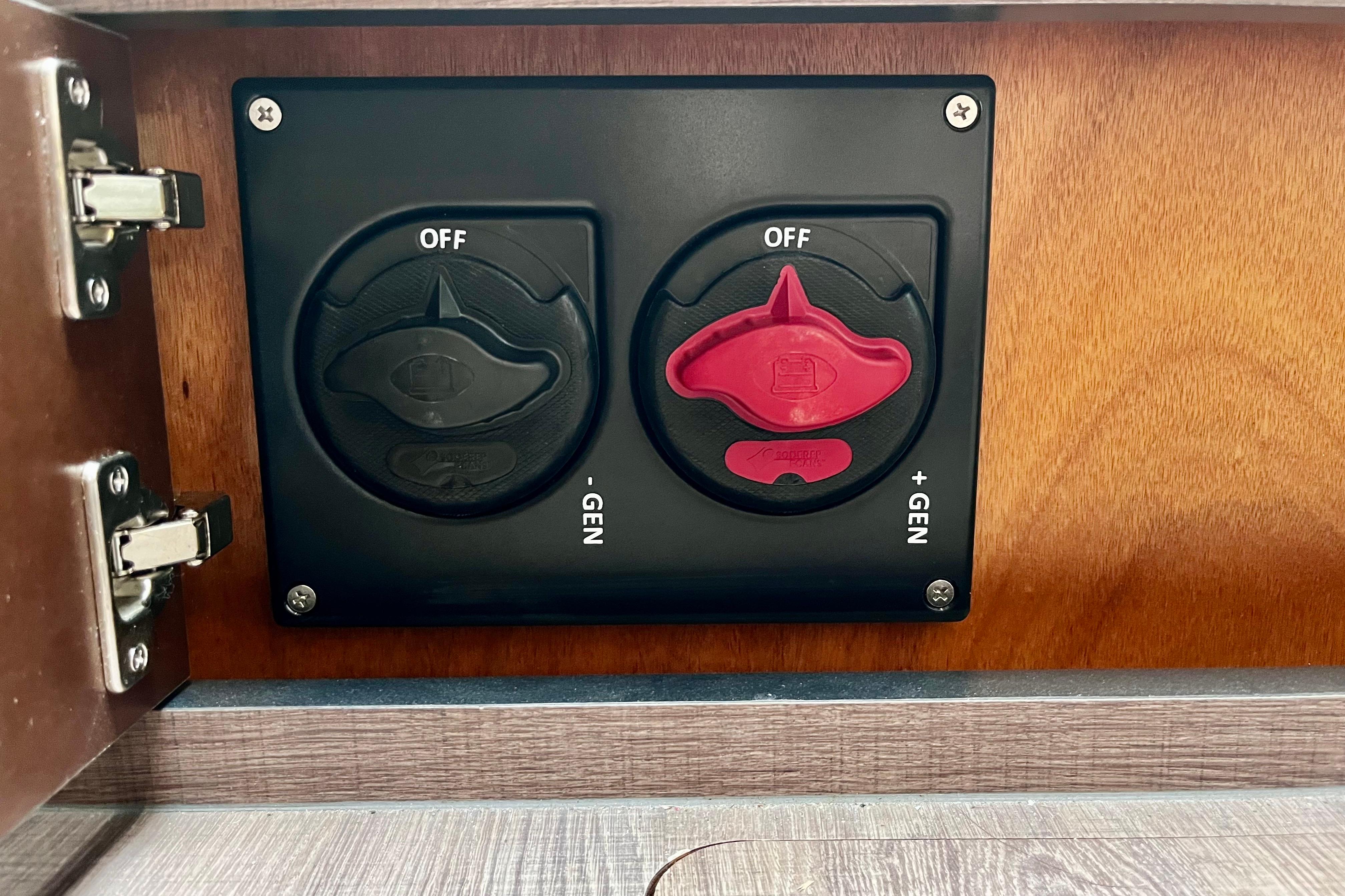 Control panel on 2023 Beneteau Gran Turismo 32 yacht, featuring generator switches.