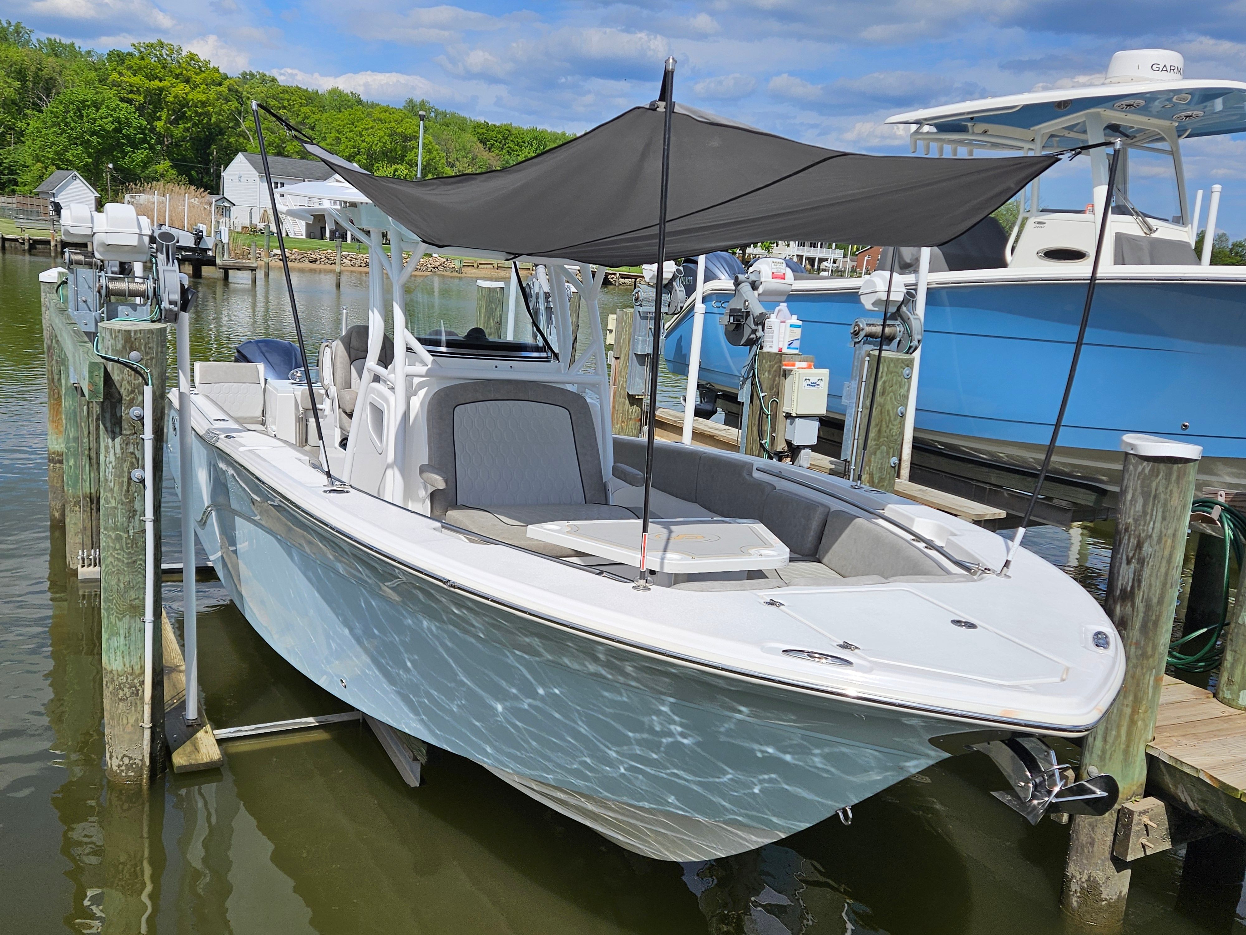 2021 Sea Fox 288 Commander boat docked at marina.