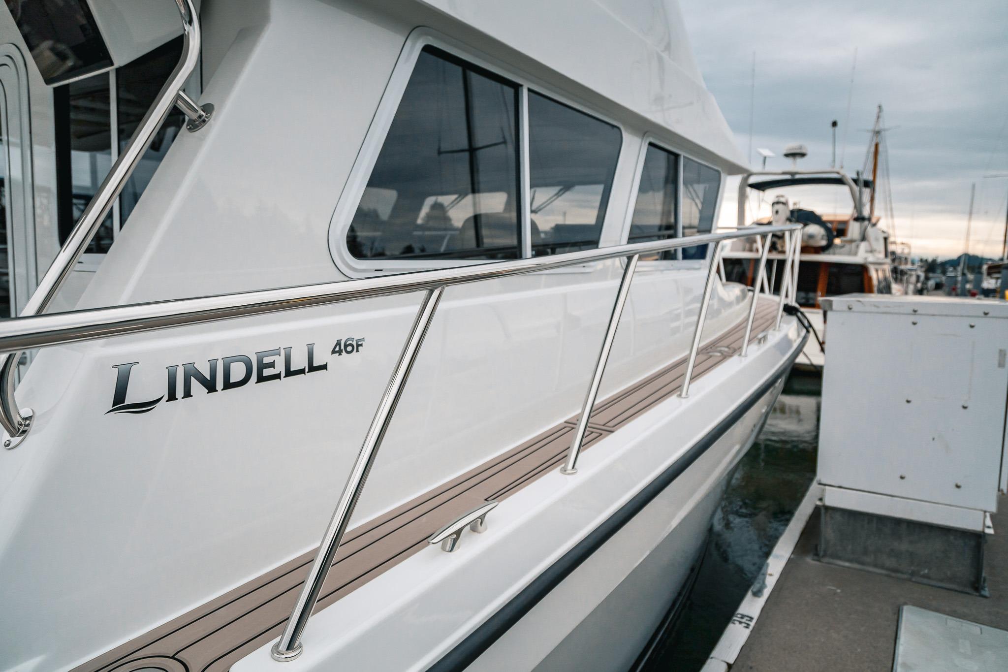 2024 Lindell 46 yacht docked at marina, showcasing sleek design and modern features.