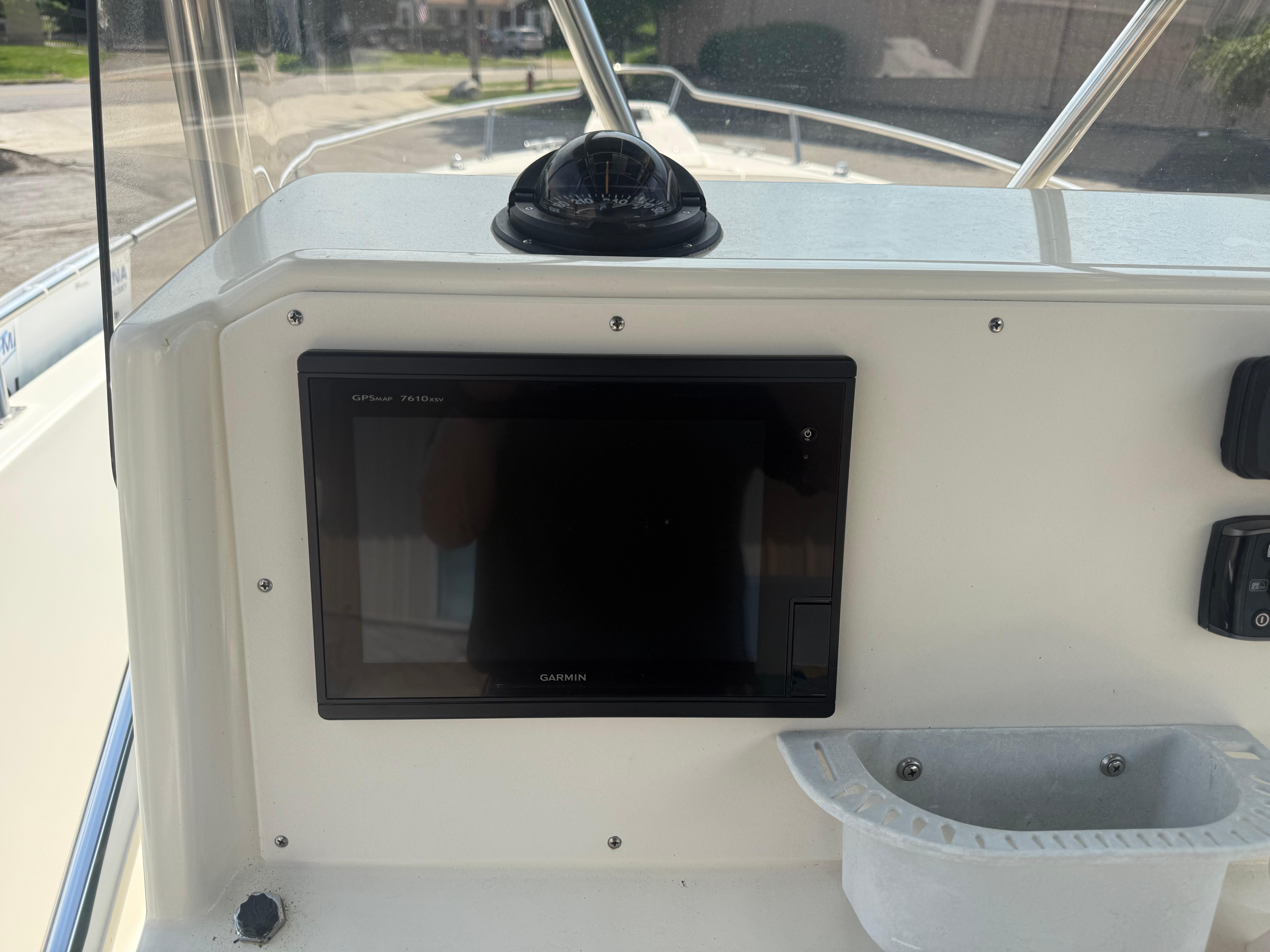 Console of a 2002 Pursuit 2470 CC boat with Garmin GPSMAP 7610xsv.
