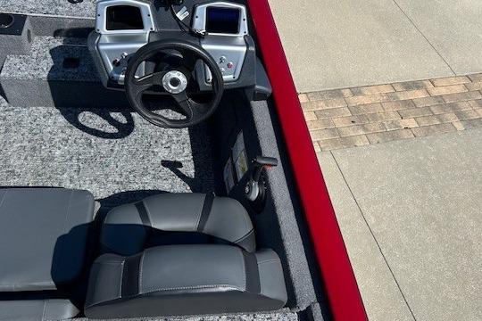 2026 Tracker Pro Team 175 boat interior with steering wheel and seats.