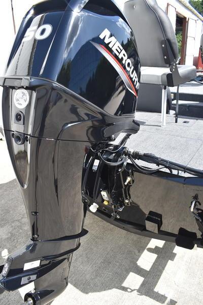 2026 Lowe Skorpion 17 boat with Mercury outboard motor, close-up view.