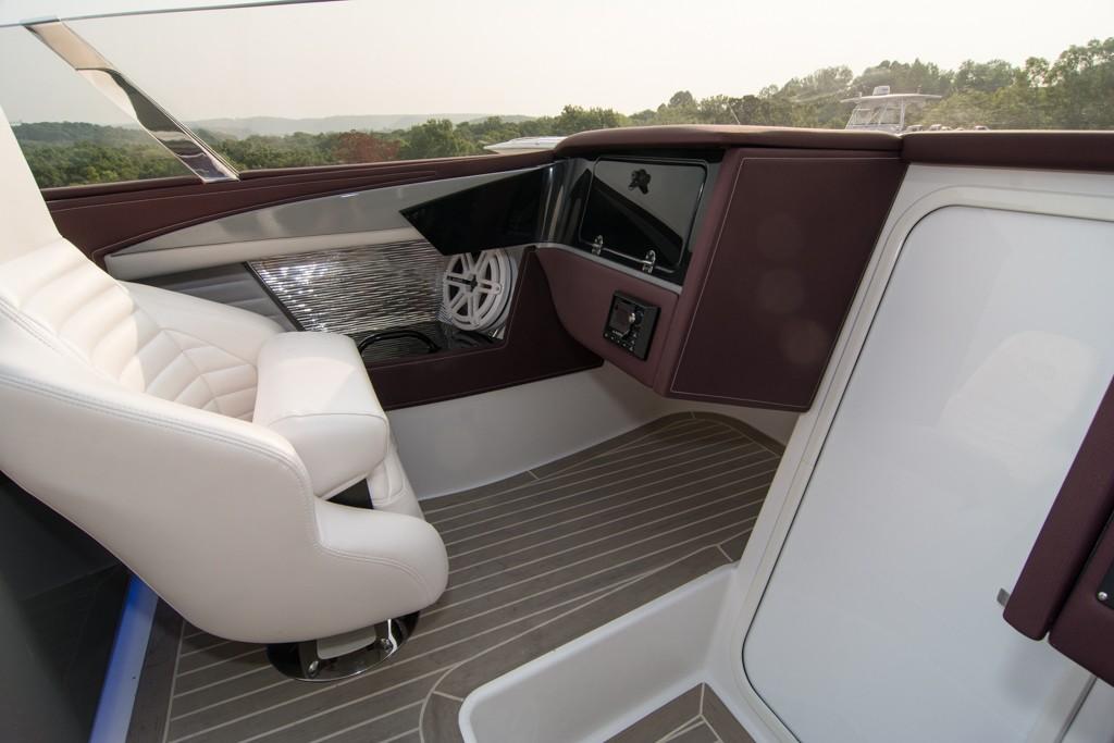 2019 Donzi 41 GT boat interior with white seating and modern dashboard.