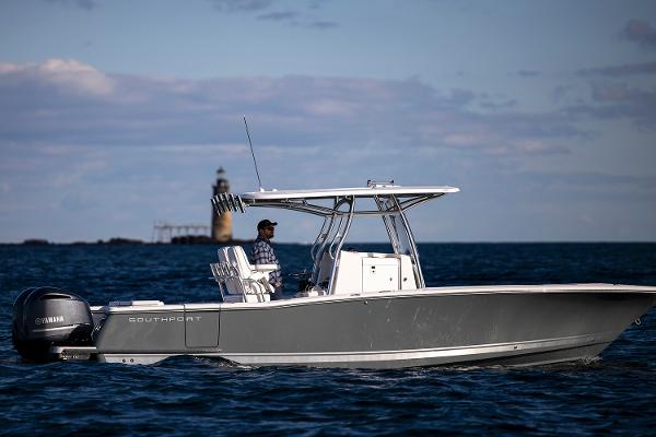 Manufacturer Provided Image: 2025 Southport 27 FE boat cruising on open water near a lighthouse.