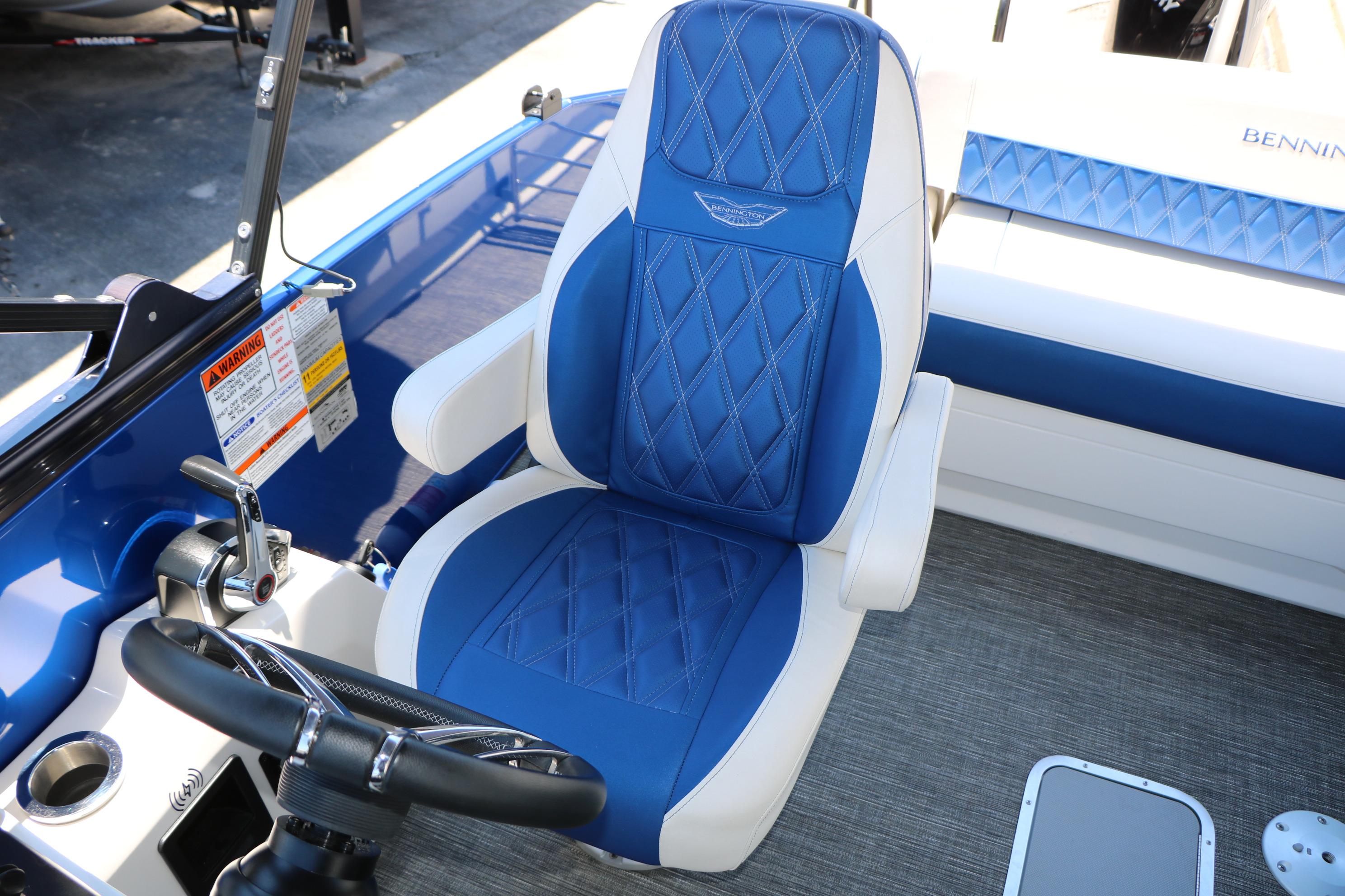2024 Bennington 23 RX Swingback boat seat with blue and white upholstery.