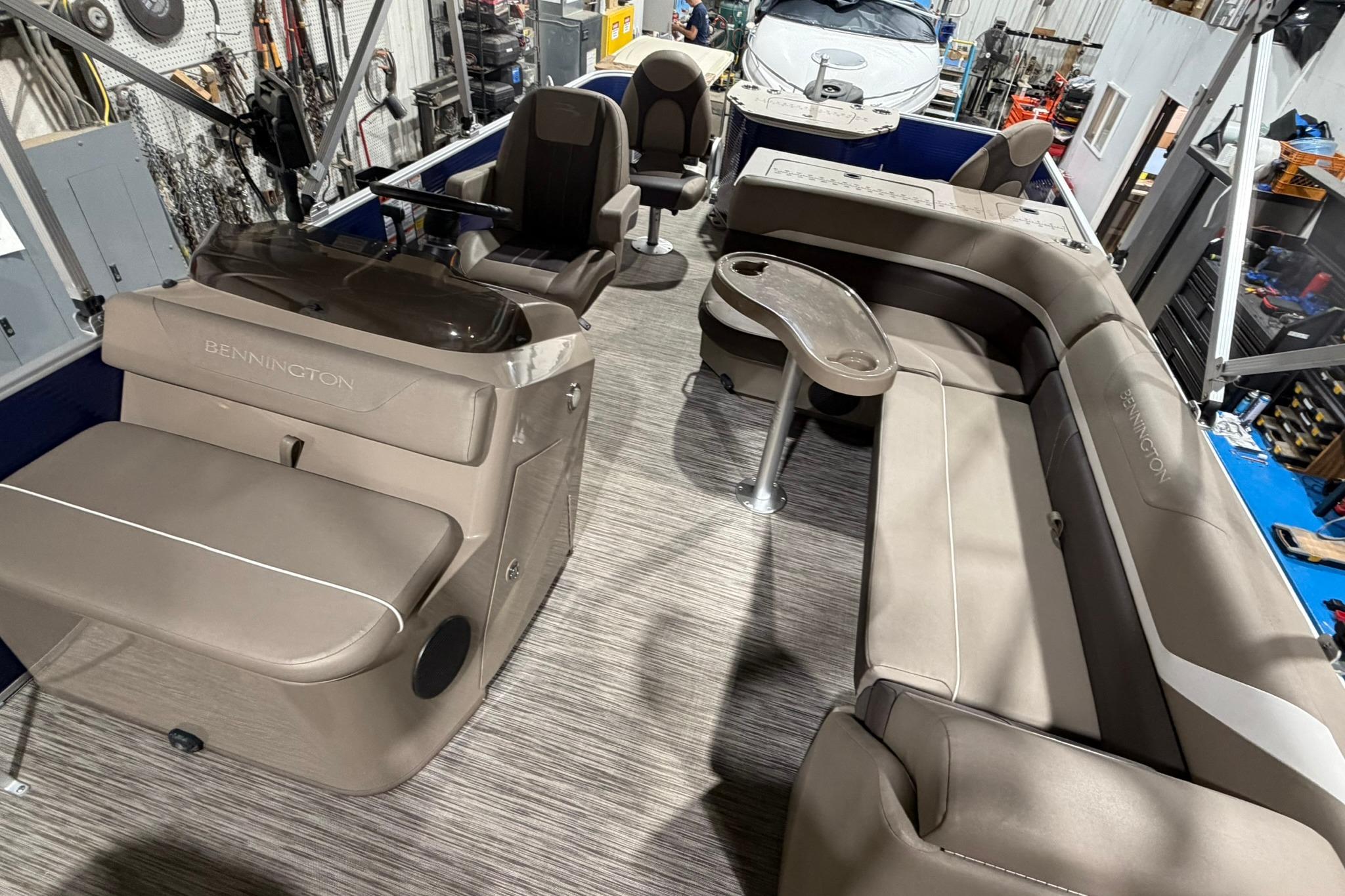 2020 Bennington SX 22 SFX pontoon boat interior with beige seating and modern design.