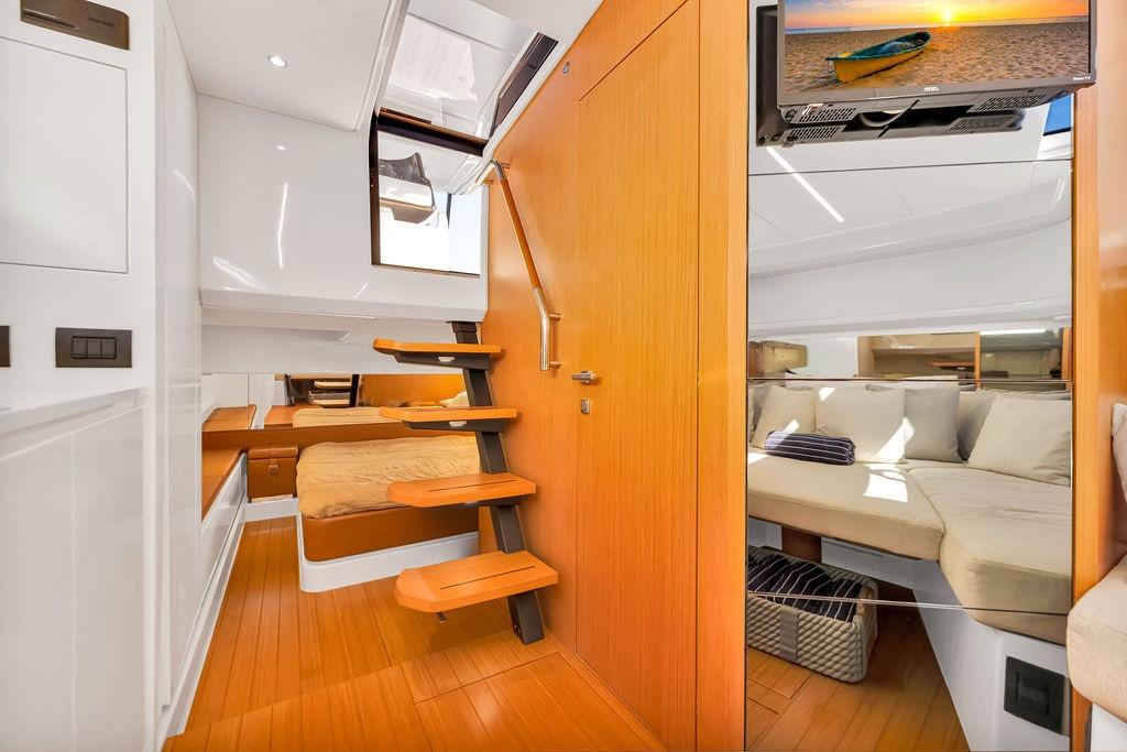 Luxurious interior of 2021 Bluegame BG 42 yacht with cozy seating and modern design.