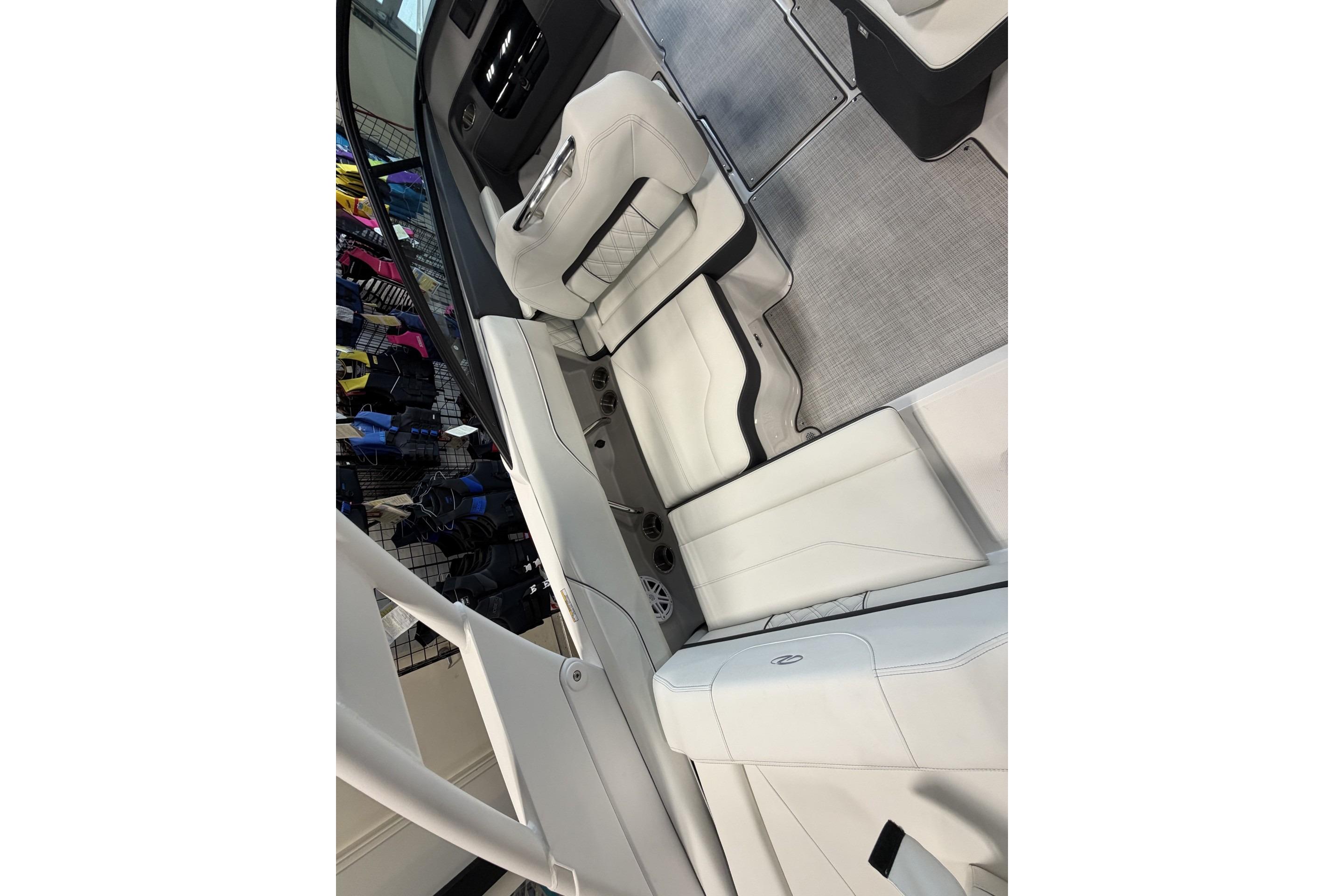 Luxurious interior of a 2027 Regal LS2 boat with white seating and modern design.