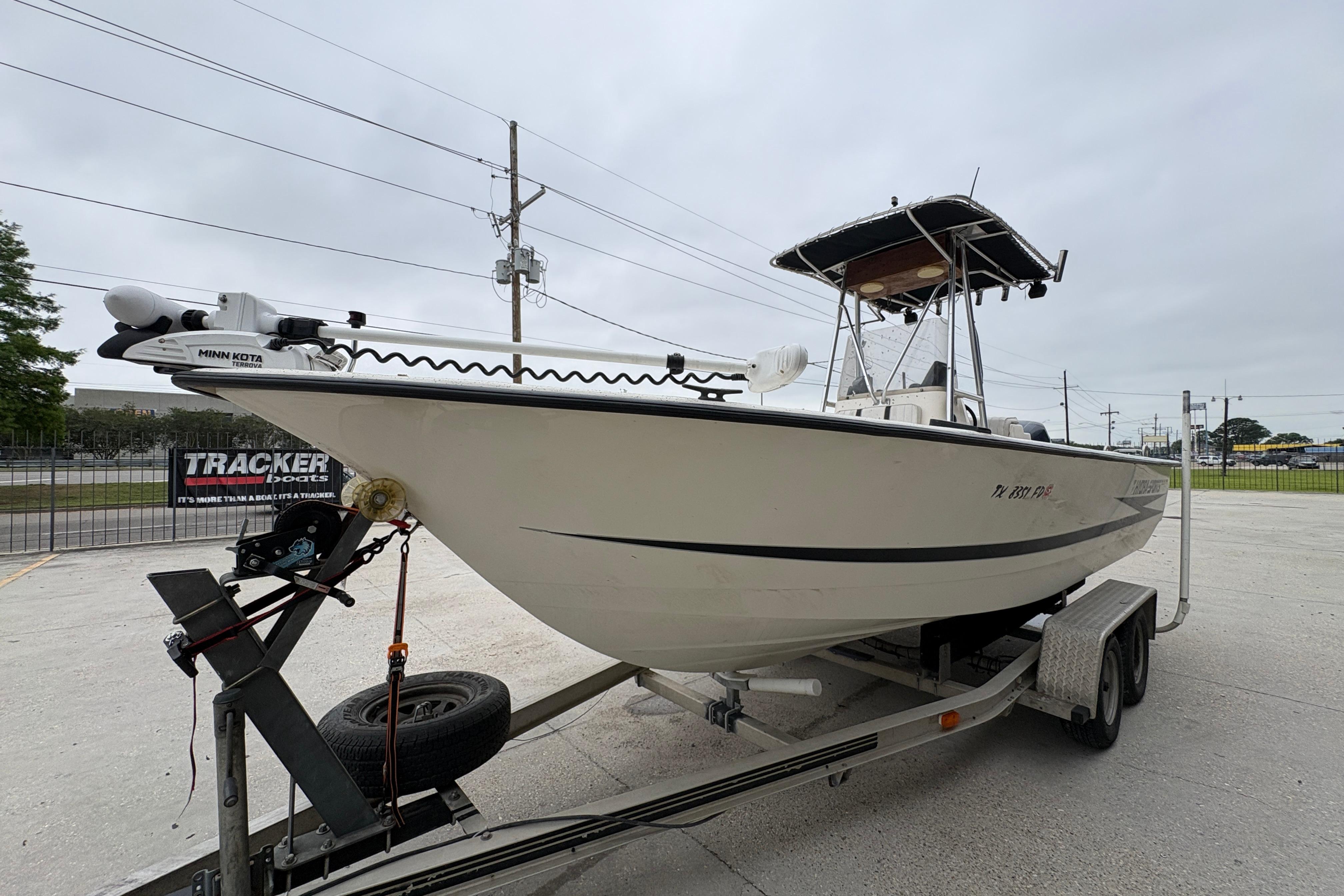 1998 Hydra-Sports 22 Ocean CC boat on trailer, featuring Minn Kota trolling motor.