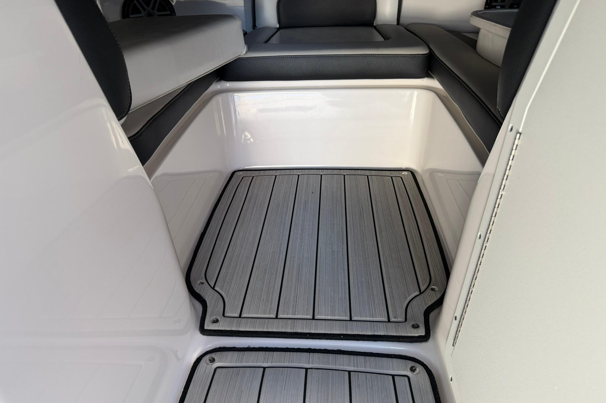 2024 Yamaha Boats AR190 interior with cushioned seating and non-slip flooring.