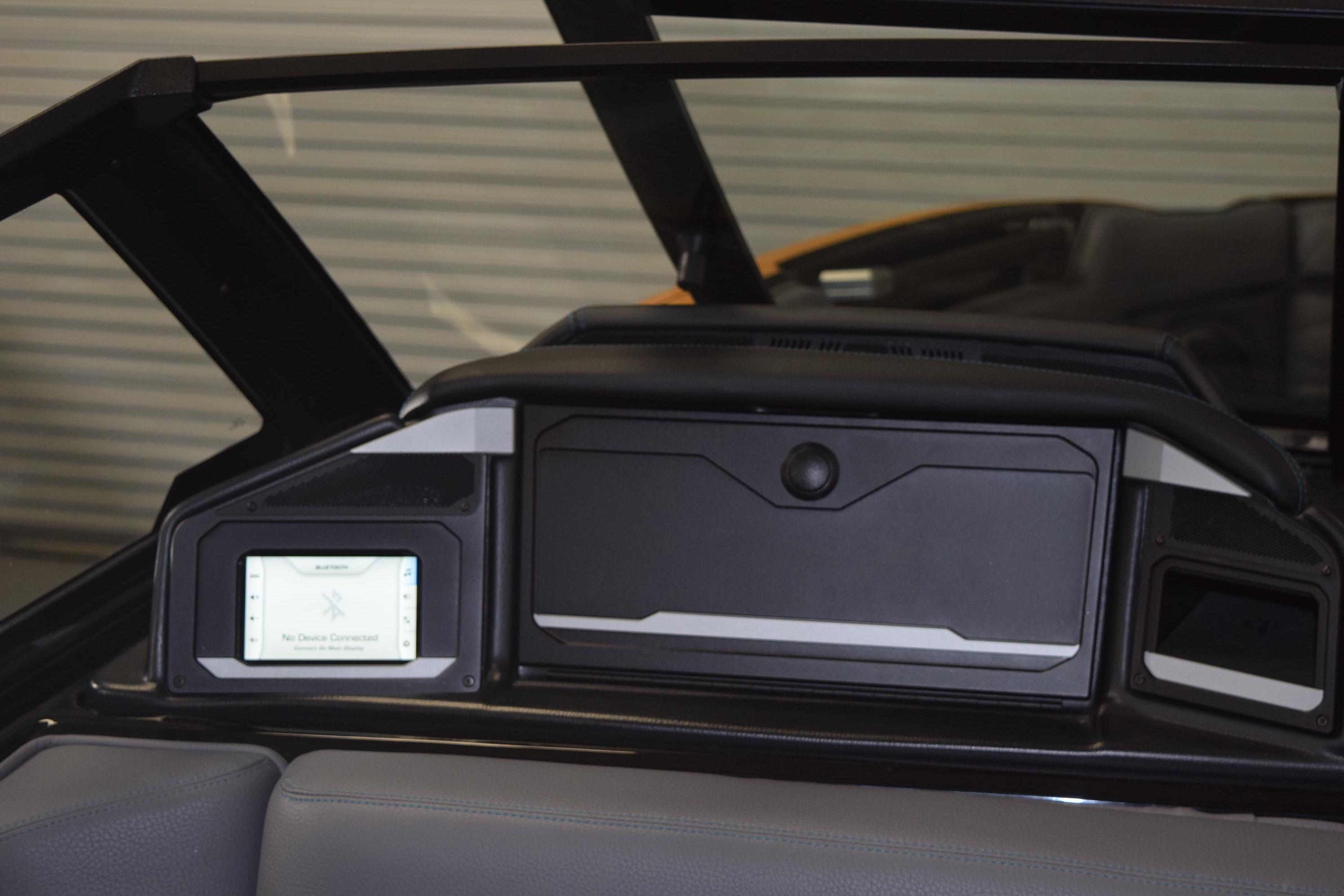 2026 Supra SL 550 dashboard with touchscreen and storage compartment.
