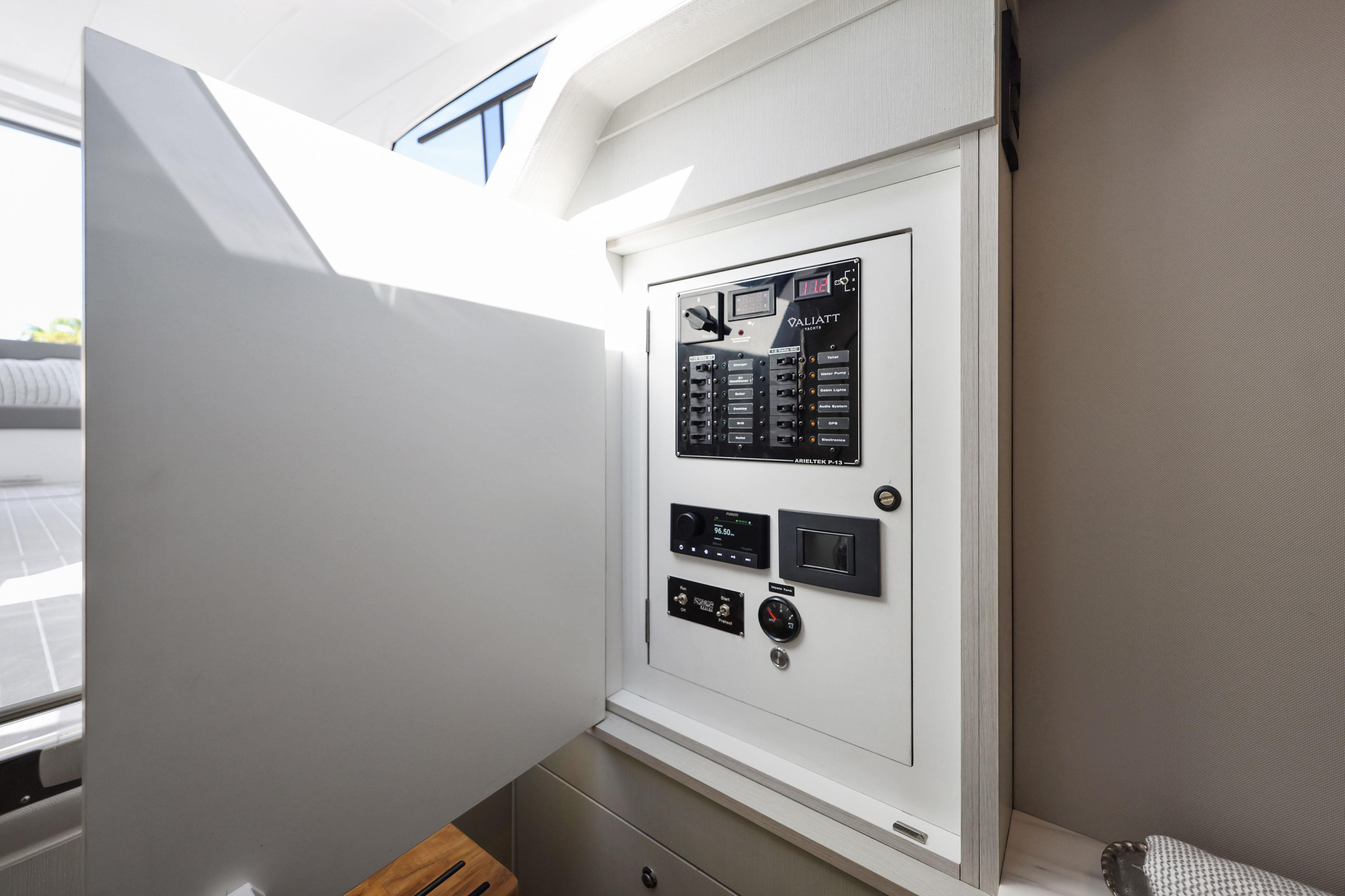 Electrical panel inside 2025 Valiatt 380 Bowrider boat, showcasing modern control systems.