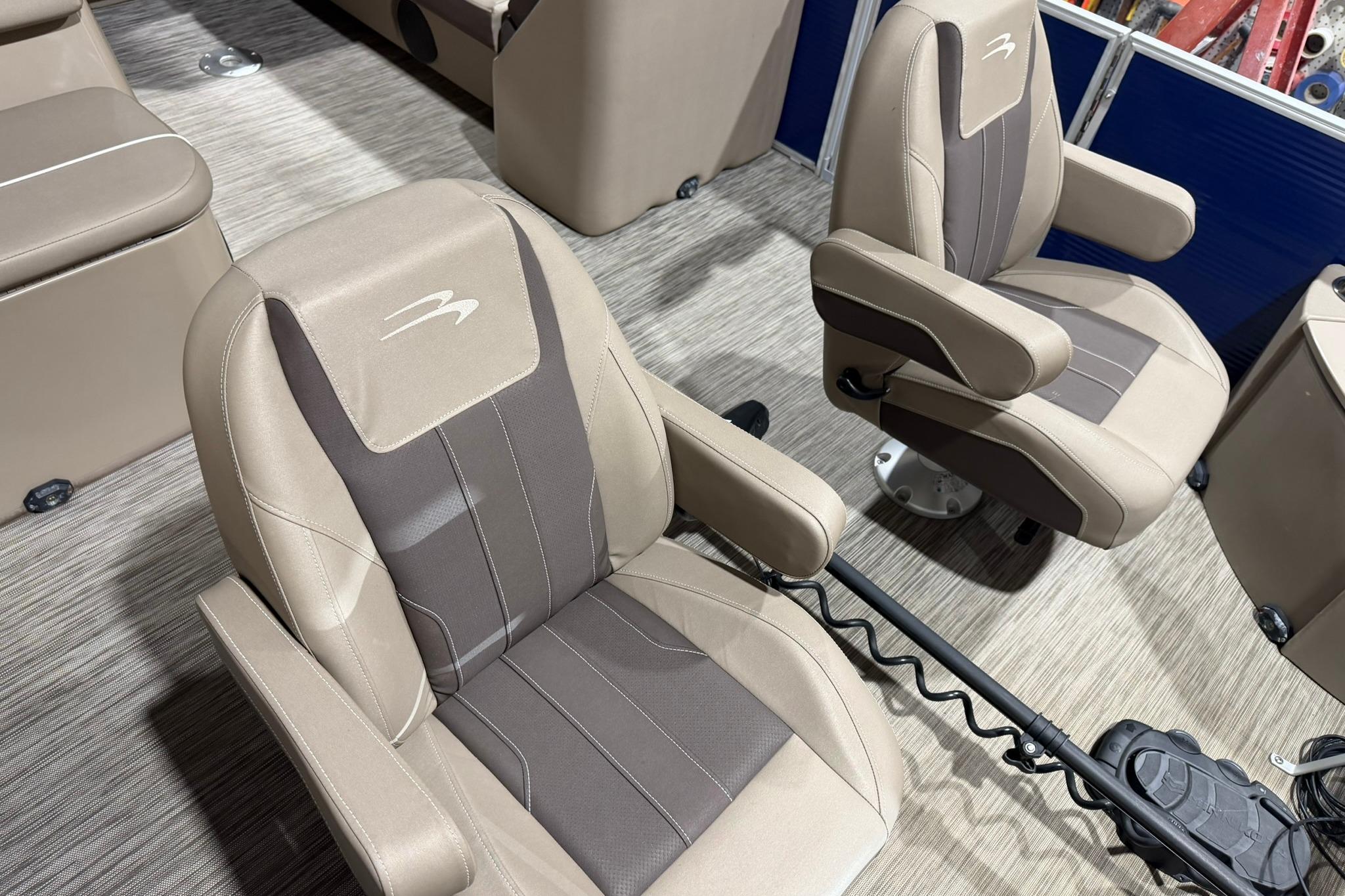 2020 Bennington SX 22 SFX boat interior with beige and brown seating.