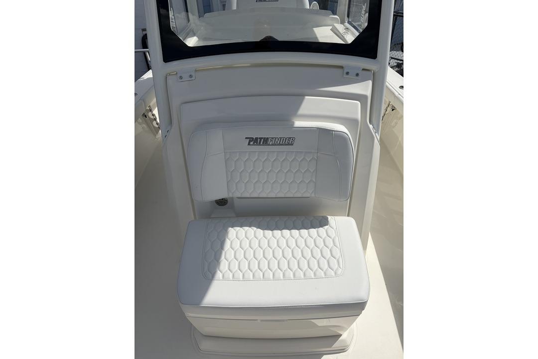White seating on 2026 Pathfinder 2800 Hybrid boat, featuring hexagonal pattern upholstery.
