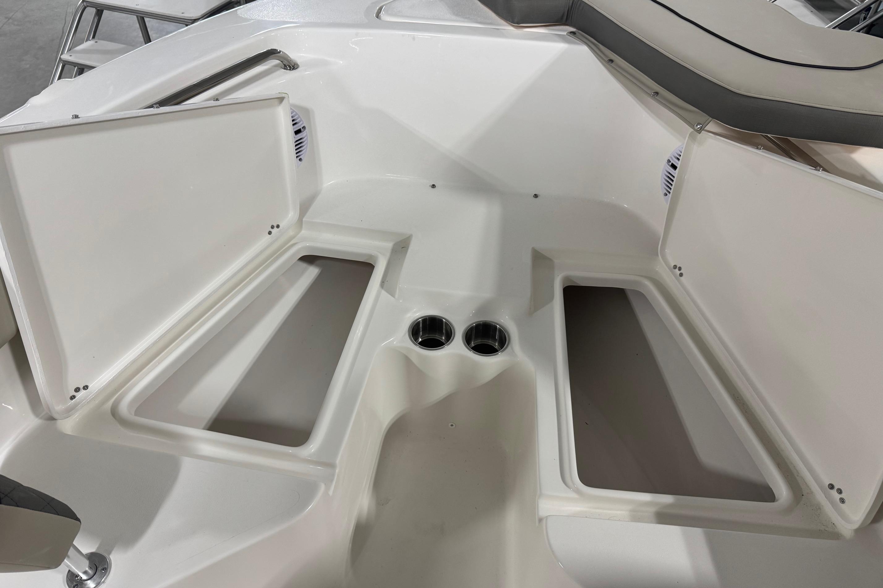 Interior view of 2026 Key West 203 FS boat with open storage compartments.