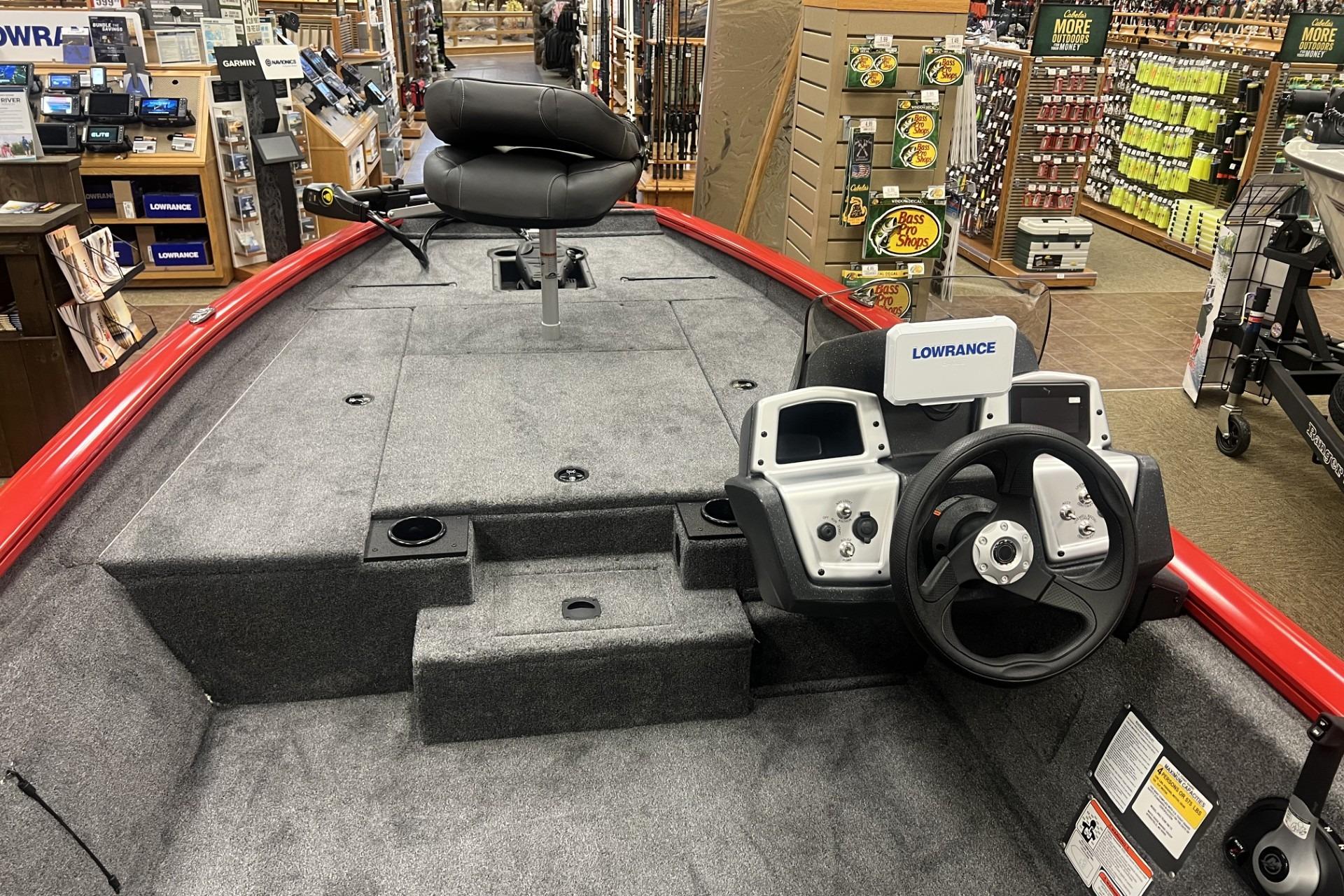 2026 Tracker Pro Team 190 boat interior with steering wheel and Lowrance electronics.
