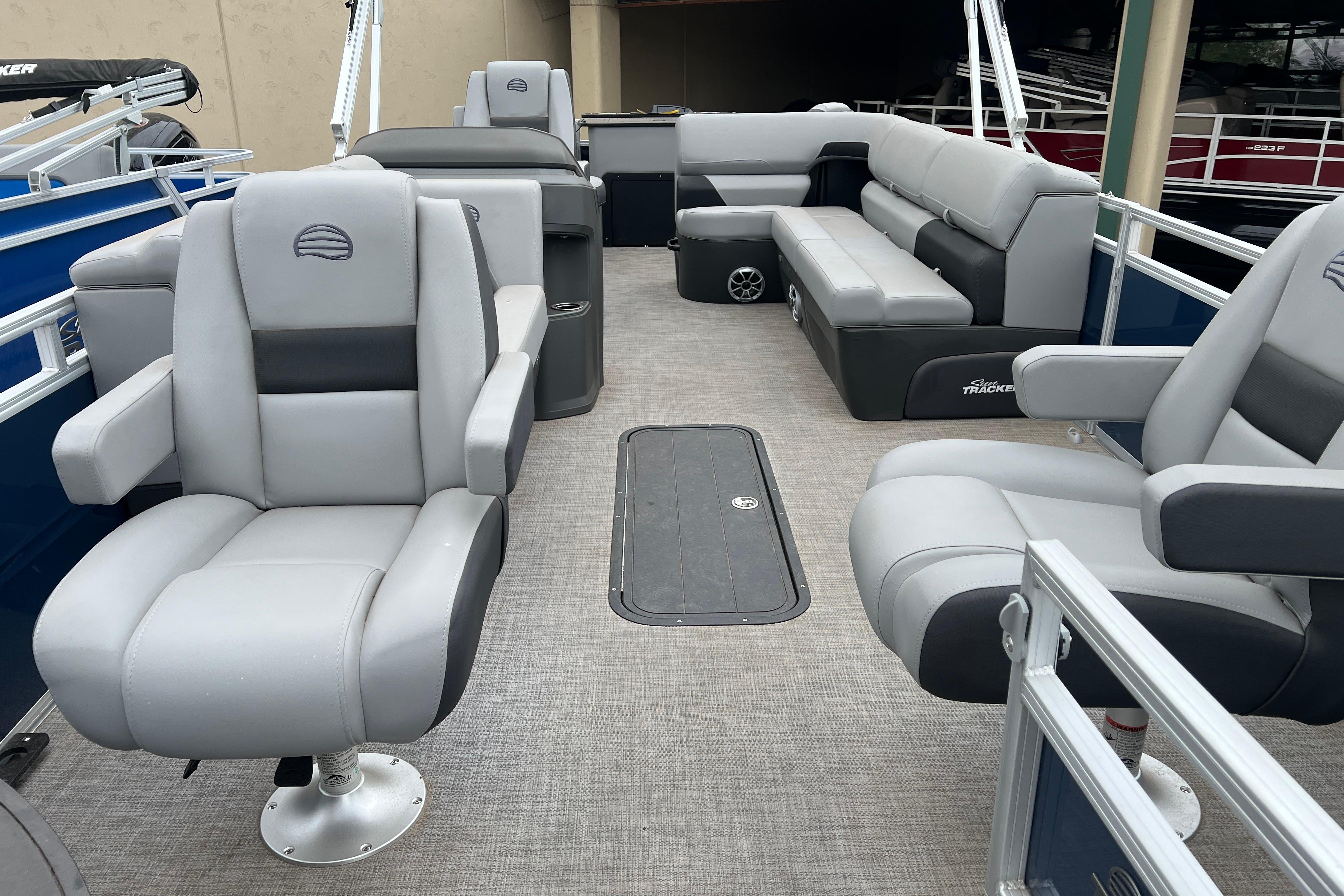 2026 Sun Tracker Sportfish 24 XP3 pontoon boat interior with plush seating and modern design.
