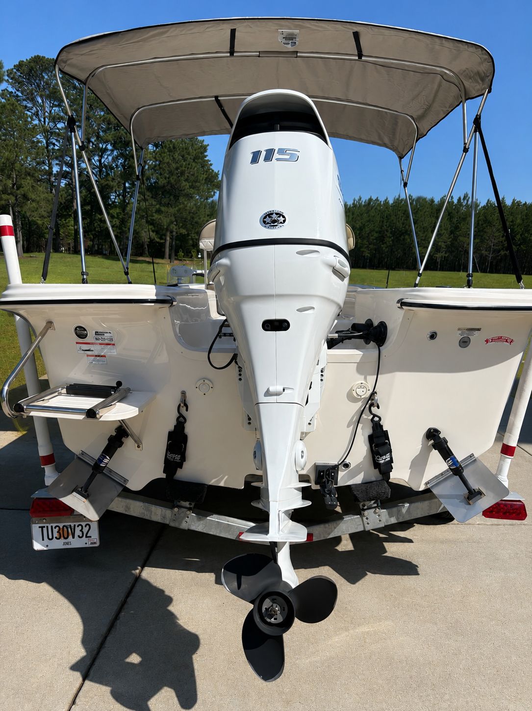 A 2022 Carolina Skiff 17 LS boat with a 115 HP outboard motor.