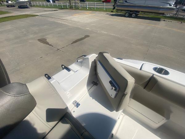 2024 Key West 239 FS boat interior with seating and storage compartments.
