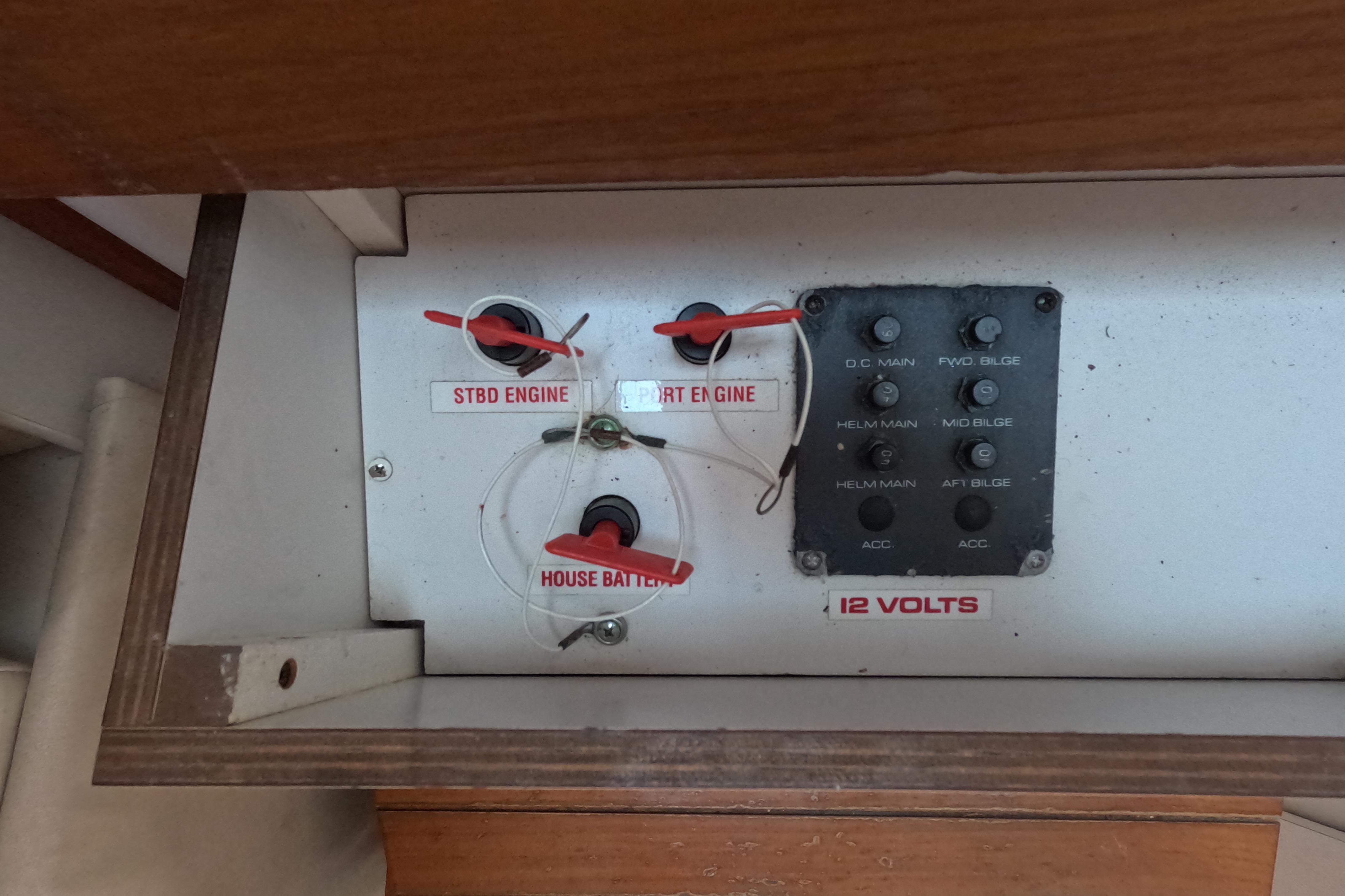 1995 Tiara Yachts 2900 Open electrical panel with engine and battery switches.