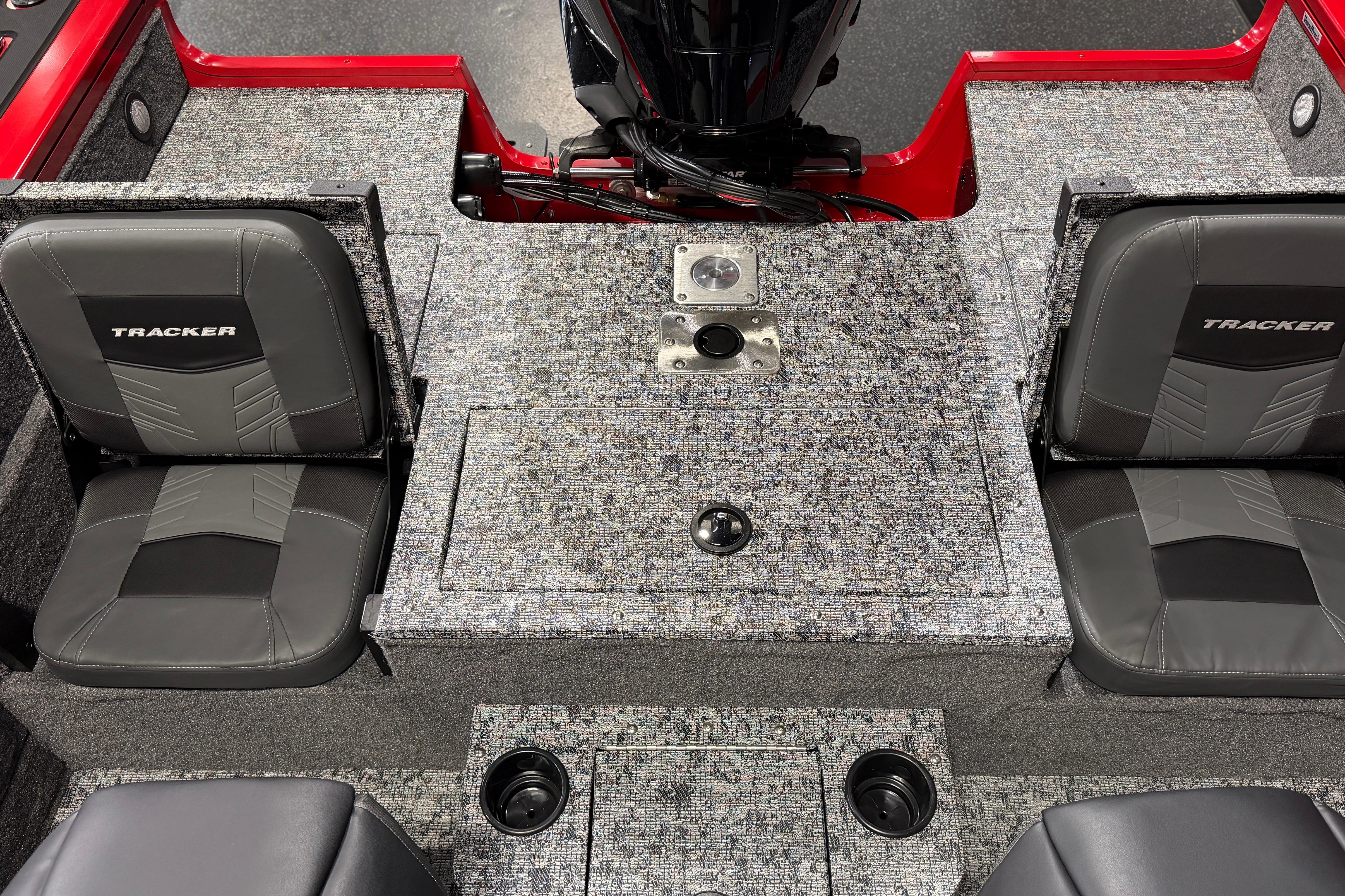 2026 Tracker Targa V-18 Combo boat interior with gray seats and textured flooring.